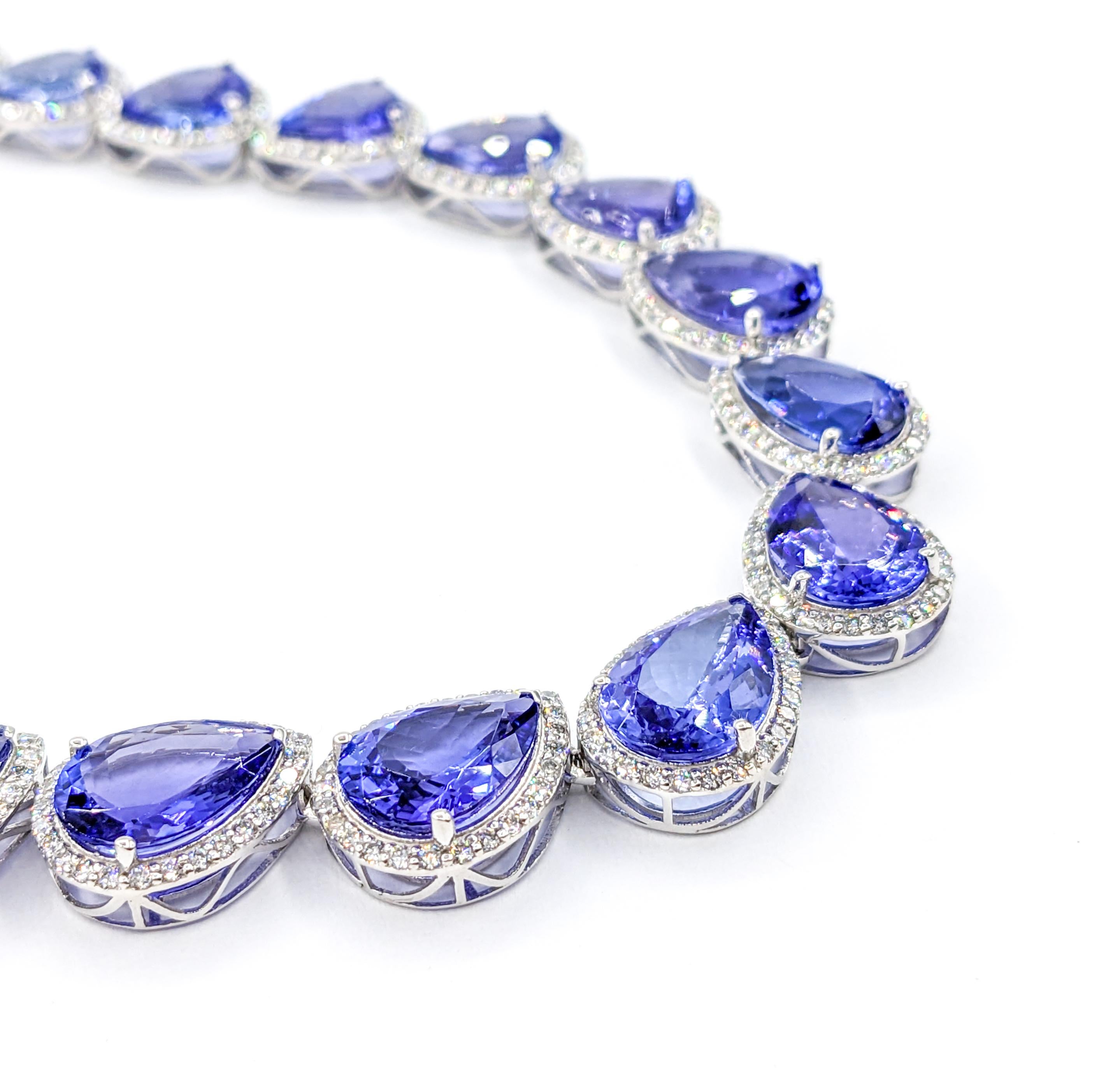 89ctw Tanzanite & Diamond Necklace White Gold

Introducing this exquisite Necklace, a masterpiece crafted in 14kt white gold, featuring a stunning array of diamonds totaling 3.43 carats. These sparkling diamonds boast an I clarity and a near