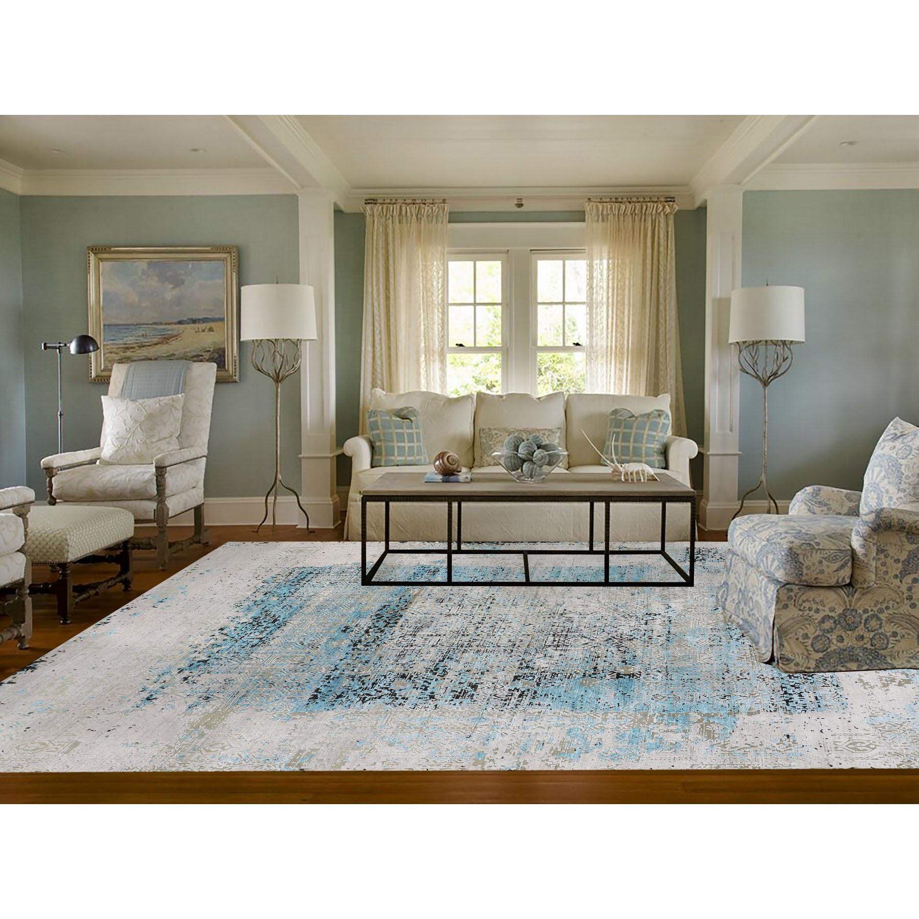 This is a truly genuine one-of-a-kind Teal Blue Jewellery Design Tone On Tone Silk With Textured Wool Rug. It has been Knotted for months and months in the centuries-old Persian weaving craftsmanship techniques by expert artisans.
Primary materials: