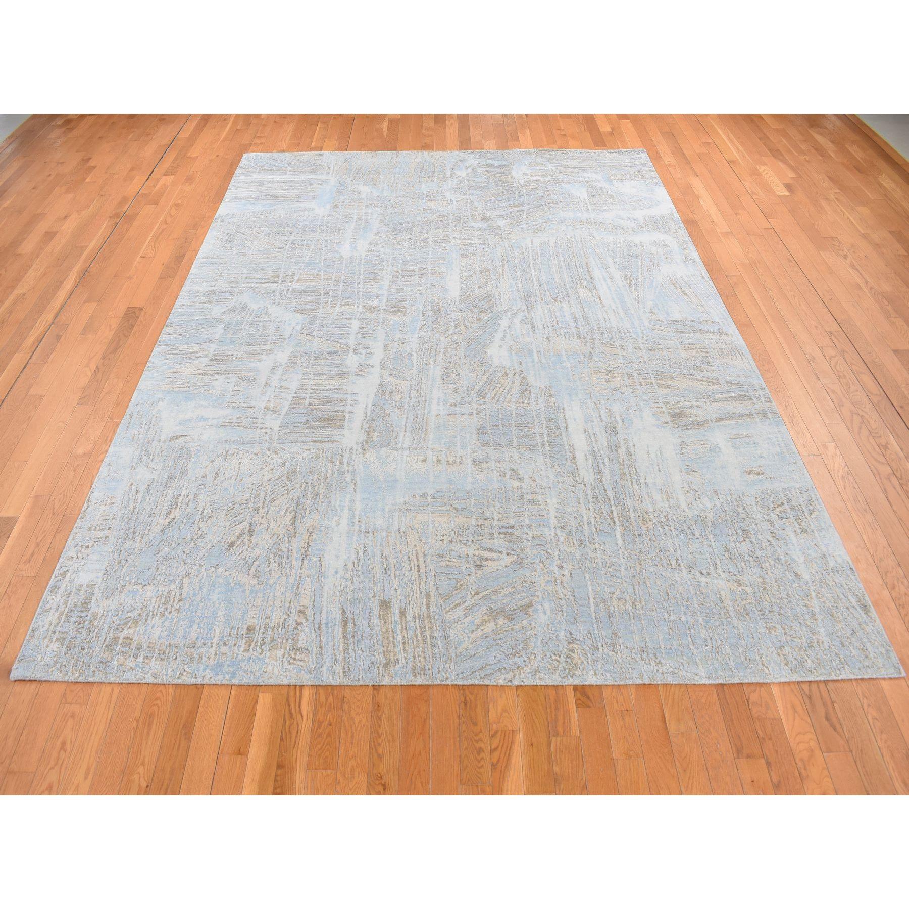 Blu polvere, THE PAINT BRUSH, Seta con lana strutturata, Annodato a mano, Tappeto orientale
Materiali primari: Lana e seta
Lattice: No Pile 
altezza: 0,25 pollici
Stile: Di transizione
Colore primario: Blu
Colori secondari: Avorio, Marrone
Modello: