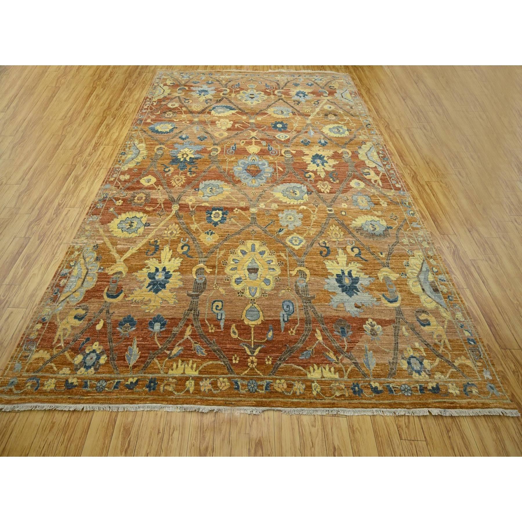 Rust Red, Persian Inspired Design with Distinct Abrash, 100% Wool, Vegetable Dyes, Hand Knotted, Oriental Rug
Primary materials: Wool
Latex: No Pile 
height: 0.25 Inches
Style: Transitional
Primary color: Red
Secondary colors: Blue, Yellow, Brown,