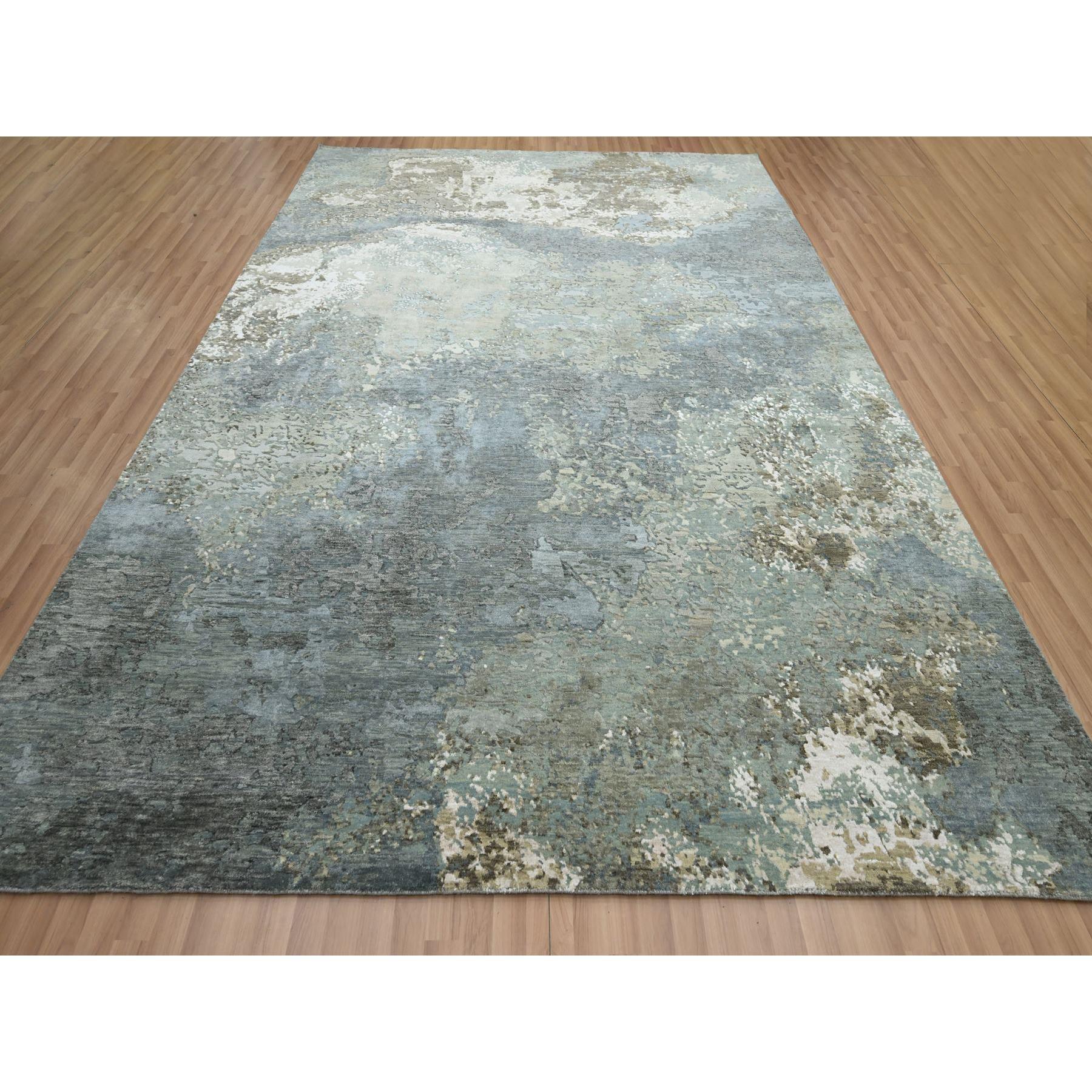 Shades of Gray, 100% Wool, Abstract with Galaxy Design, Persian Knot, Hand Knotted, Densely Woven, Oriental Rug
Primary materials: Wool
Latex: No Pile 
height: 0.25 Inches
Style: Contemporary
Primary color: Grey
Secondary colors: Brown, Ivory, Light
