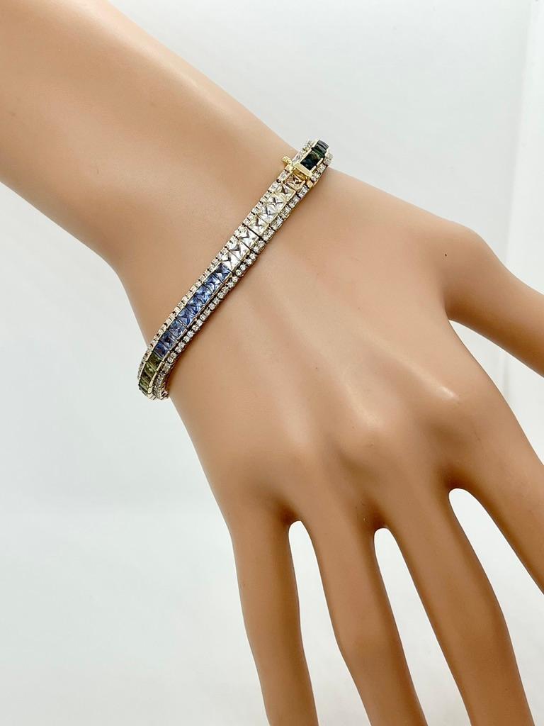 A colourful, solid and high quality bracelet is on offer here!

Featuring 8 carats of varying coloured Sapphires set with 2 carats of Diamonds in 9ct yellow gold. 
This bracelet is well made and each stone is securely set. 

The stars of this piece