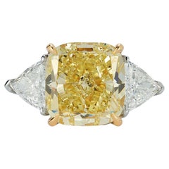 Dreisteinige Ringe mit gelbem Diamant