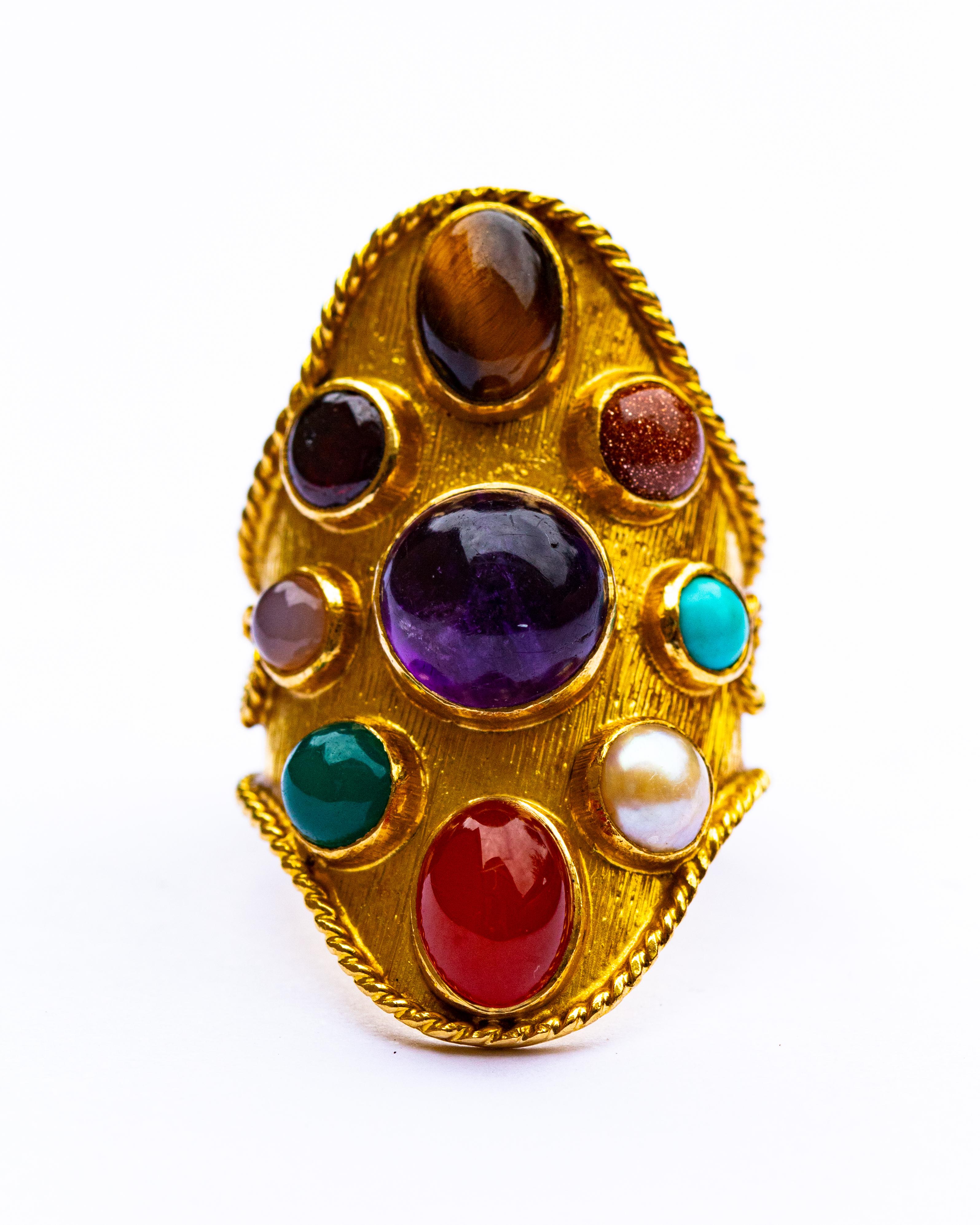 The most fabulous 18ct gold Navantra ring. Each ring symbolises a different planet.
Ring size O
height 3.5cm
Weight 10.8g