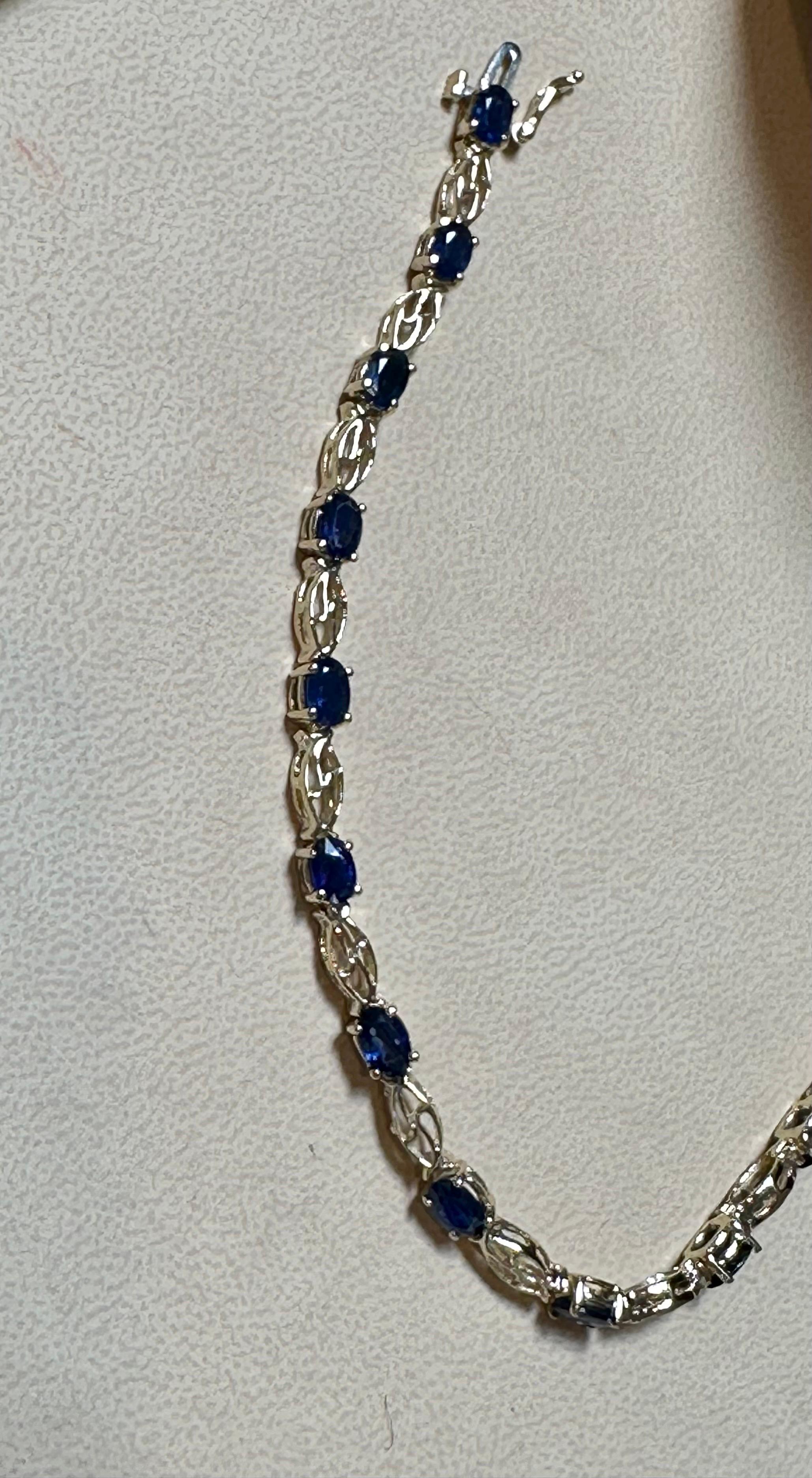 8Ct Natural Oval Blue Sapphire Tennis Bracelet 14 Karat Yellow Gold, 7 Inch Long In New Condition For Sale In New York, NY
