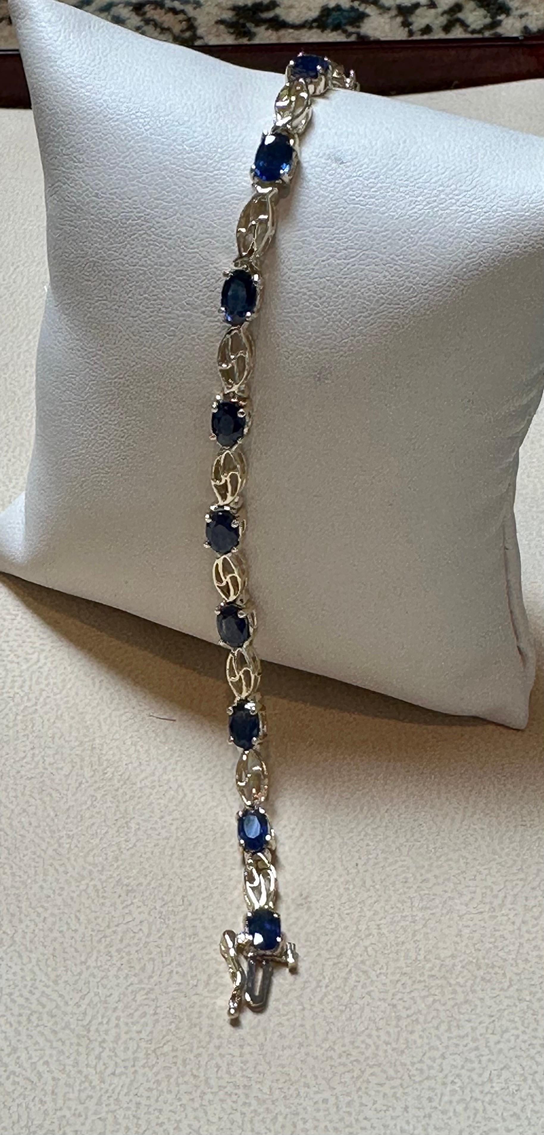 8Ct Natural Oval Blue Sapphire Tennis Bracelet 14 Karat Yellow Gold, 7 Inch Long For Sale 1