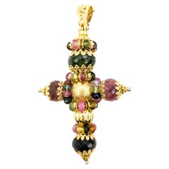 Ciondolo a forma di croce ornata da 8ctw in oro giallo 18kt