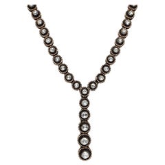 Collana decorata con diamanti naturali taglio rosa in oro 8k