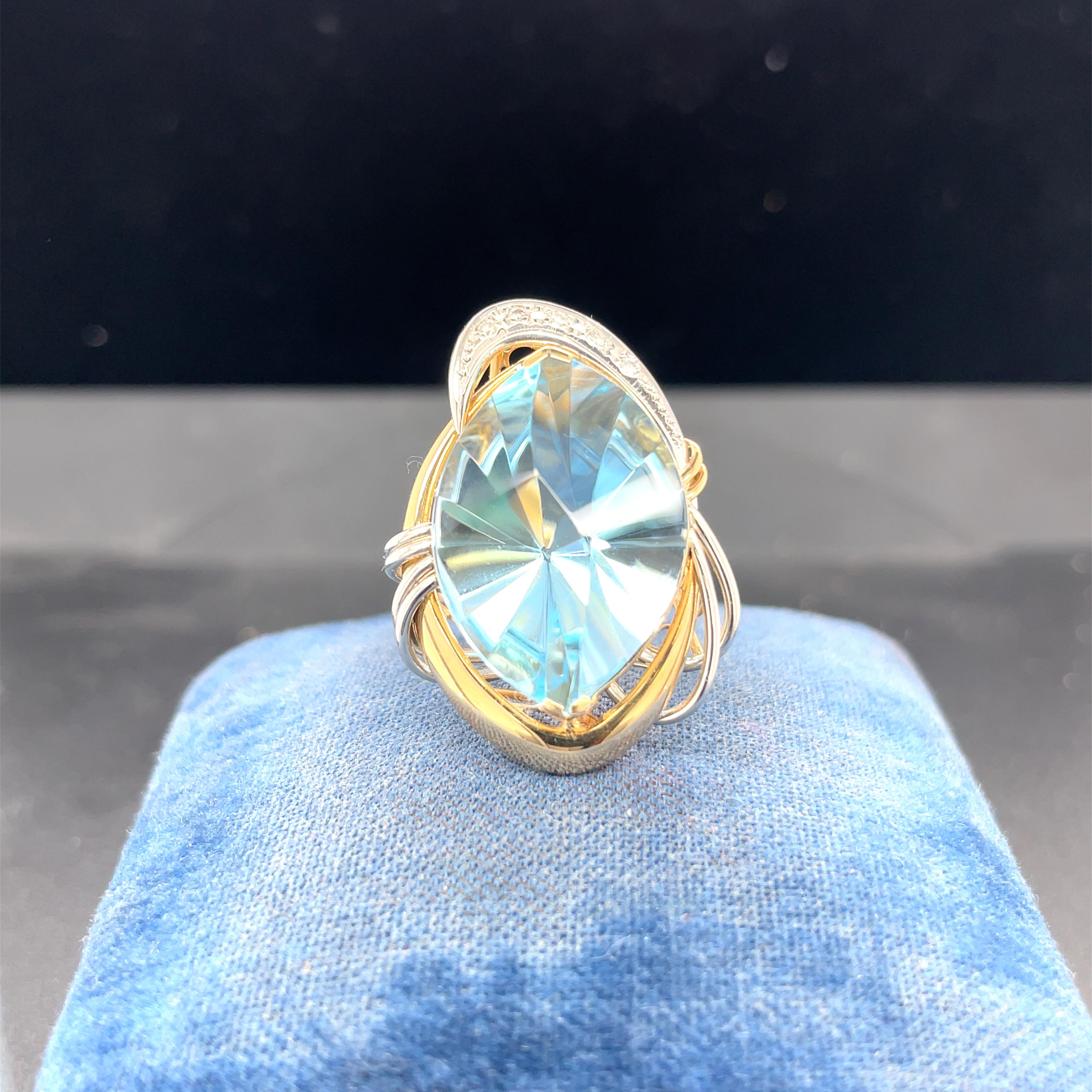Item Details: 
Ring Size: 6
Metal Type: 18k Yellow Gold  & Platinum [Hallmarked, and Tested]
Weight:  10.6 grams

Center Stone Details: 
Type: Aquamarine, Natural
Cut: Marquise Shape, Novelty Cut
Color: Blue

Diamond Details:
Weight: .07ct, total