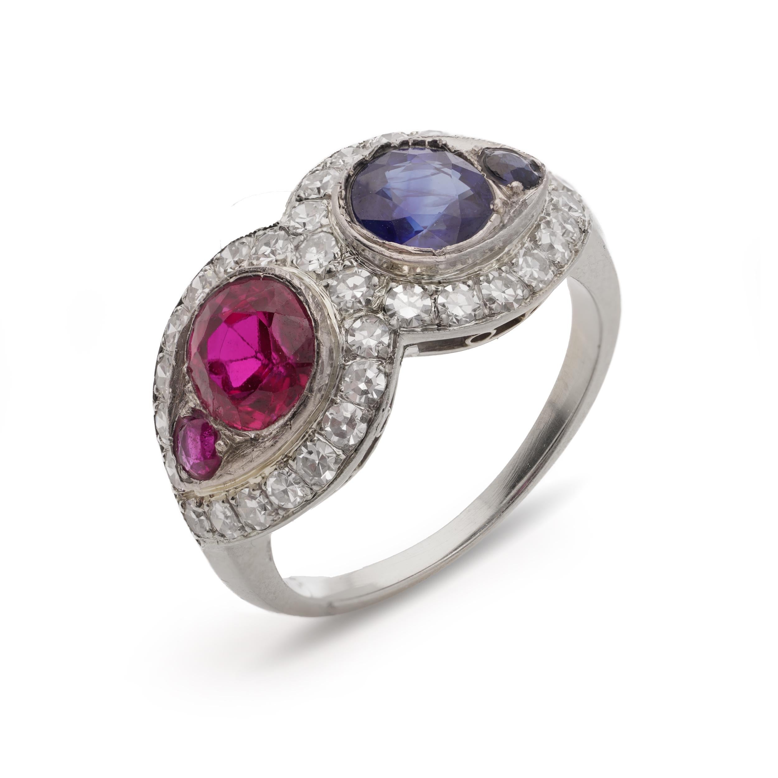 18kt. white gold ruby and sapphire ring, surrounded by round brilliant diamonds For Sale 3
