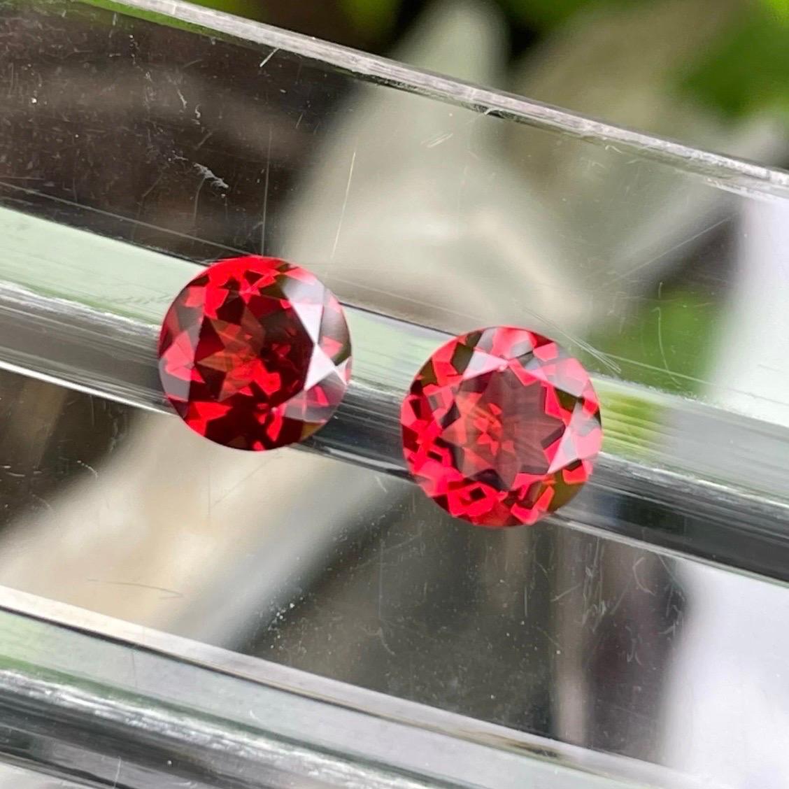 Gemstone Name	Imperial Bright Red Garnet Gemstone
Weight	4.45 Carats
Dimensions	8 x 8mm
Shape	Round
Locality	Round Brilliant
Clarity	Loupe Clean
Treatment	None
Very lustrous fine quality African garnet gemstone pair 