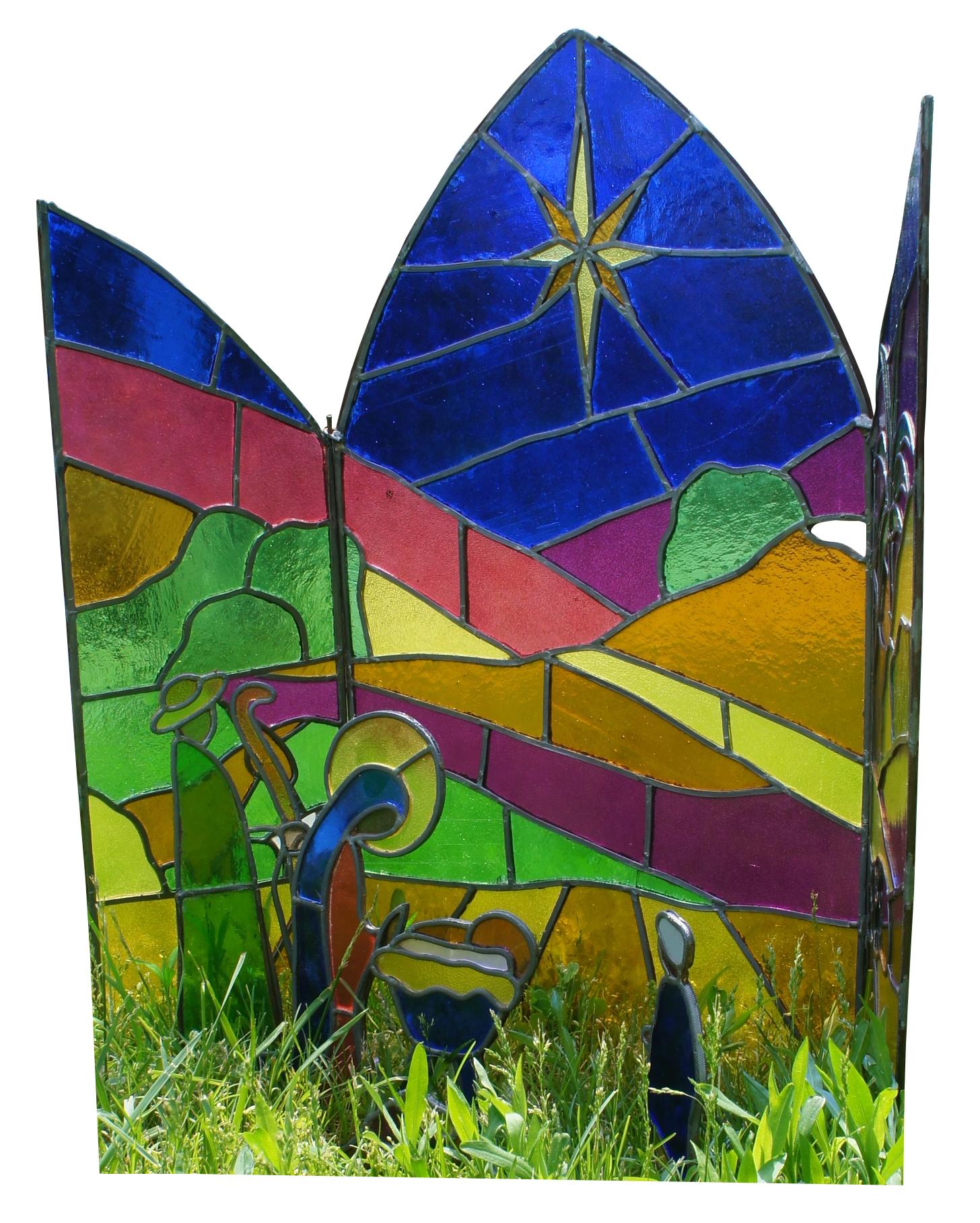 Large vintage stained glass fireplace nativity scene featuring a bright landscape with sun, figures and animals. The screen is set up for outdoor use, and all have small spikes on the bottom.

A nativity scene is a three-dimensional depiction of