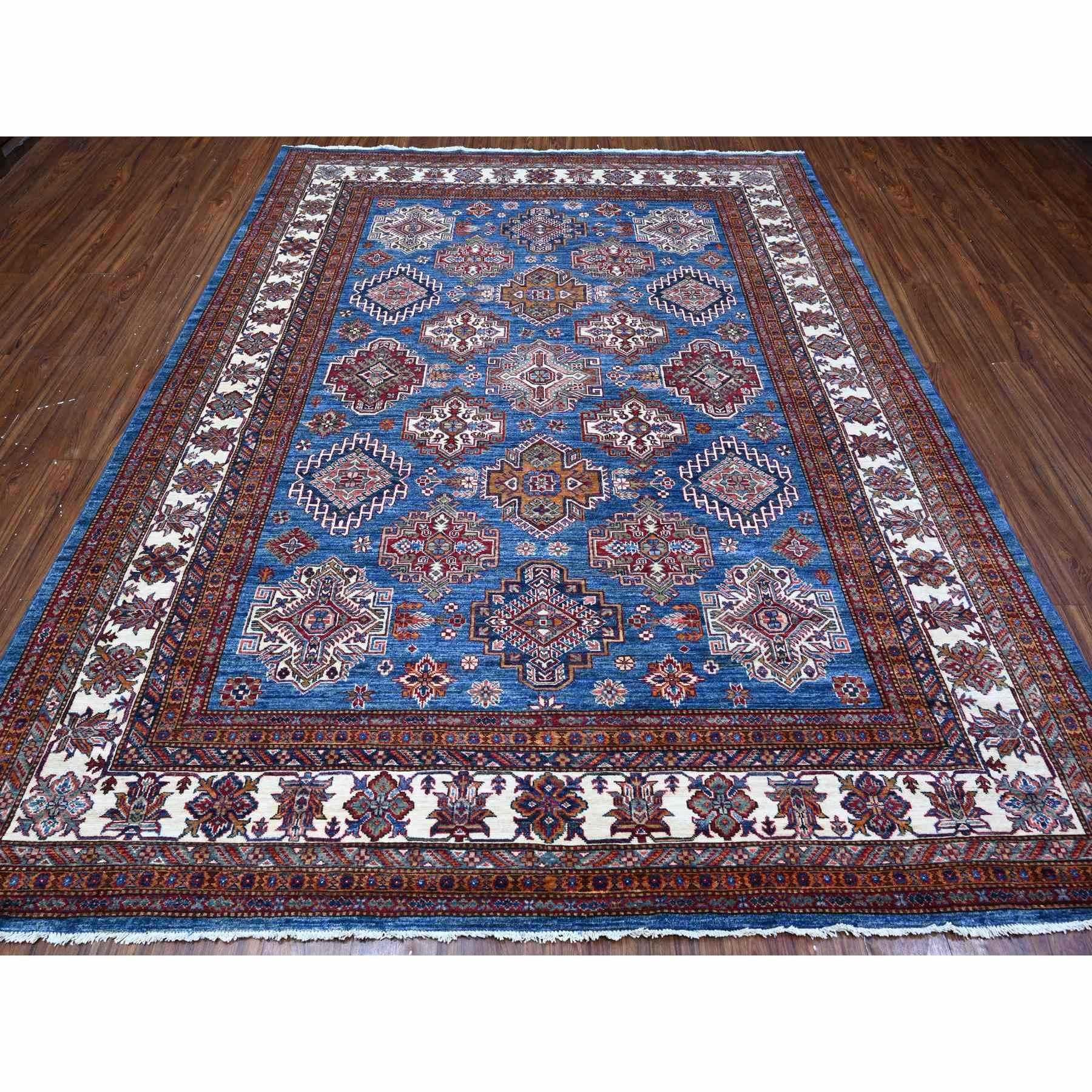 This is a truly genuine one-of-a-kind Afghan Super Kazak, Hand Knotted, Pure Wool, Oriental Rug. It has been Knotted for months and months in the centuries-old weaving craftsmanship techniques by expert artisans.
Primary materials: Wool
Latex: No