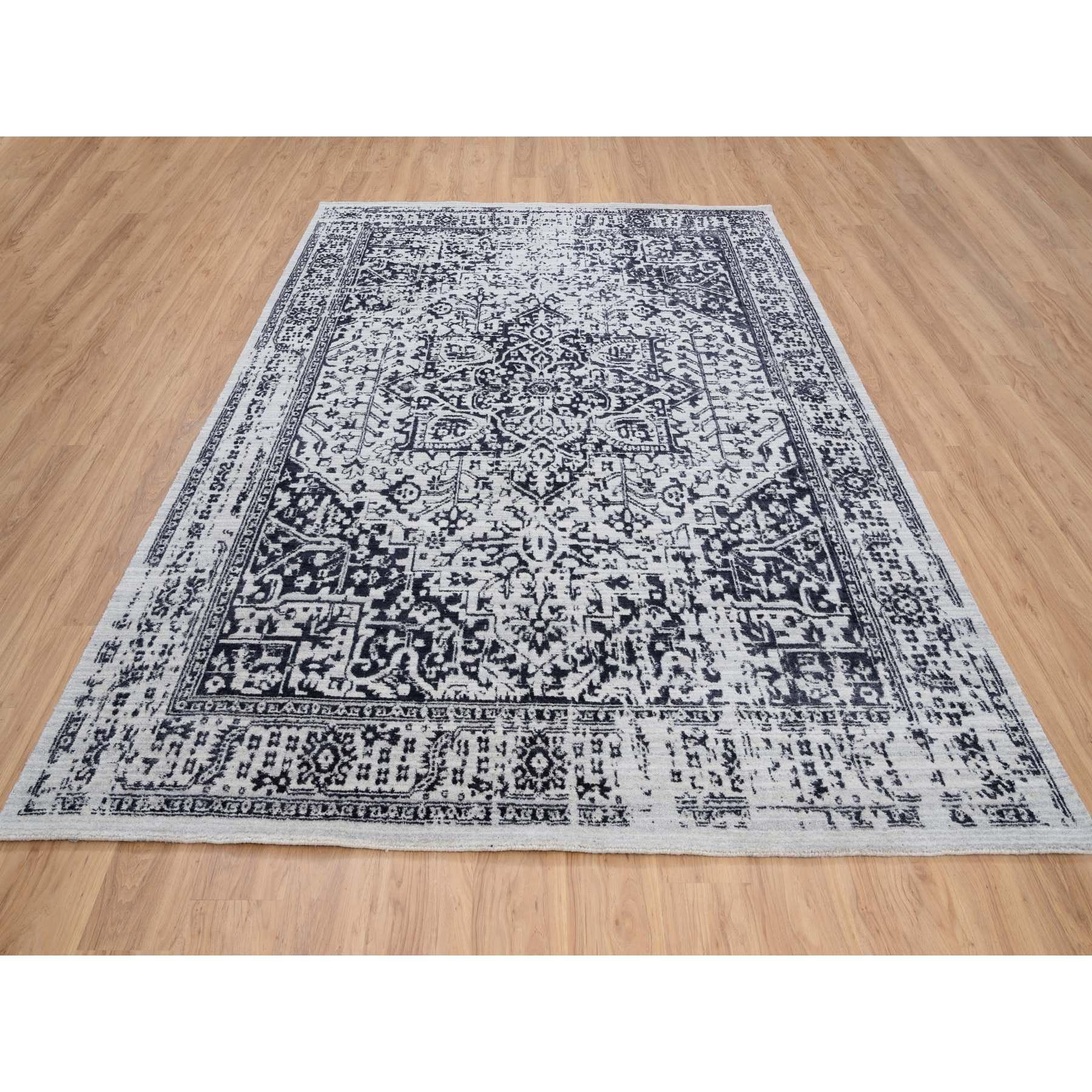 This is a truly genuine one-of-a-kind Charcoal Black, Wool and Plant Based Silk, Erased Serapi Heriz Design, Jacquard Hand Loomed, Oriental Rug. It has been Loomed for months and months in the centuries-old weaving craftsmanship techniques by expert