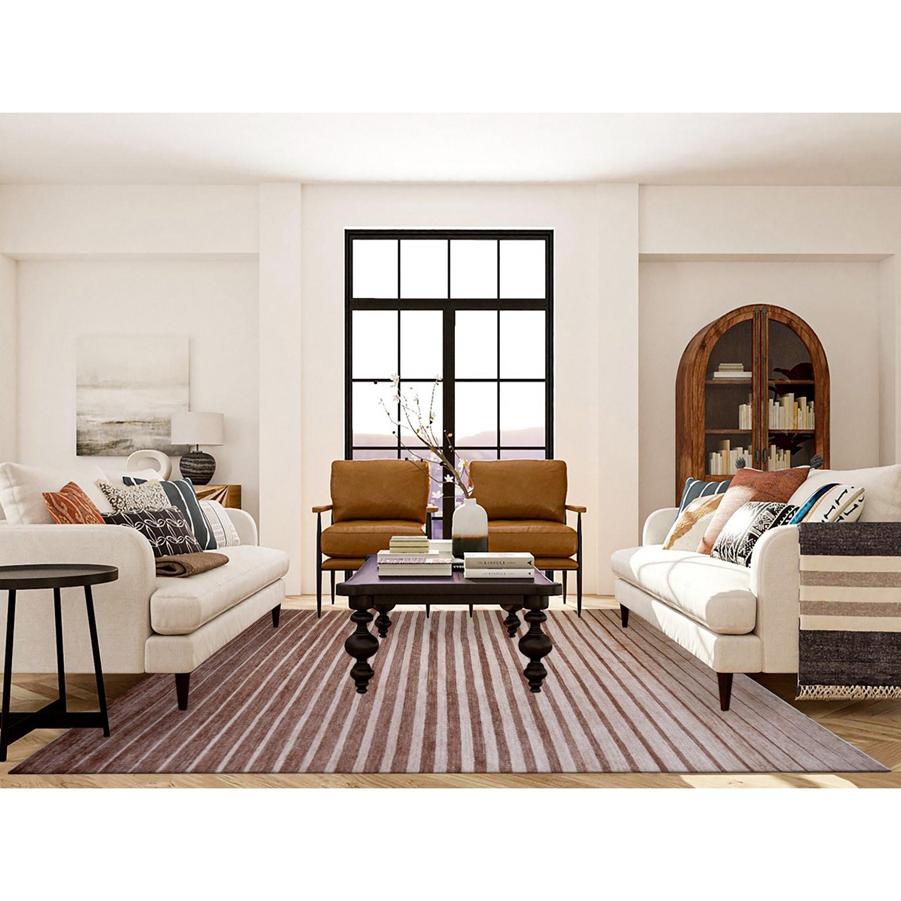This is a truly genuine one-of-a-kind Hand Knotted Striped Modern Gabbeh, Oriental Rug. It has been Knotted for months and months in the centuries-old weaving craftsmanship techniques by expert artisans.
Primary materials: Wool
Latex: No Pile