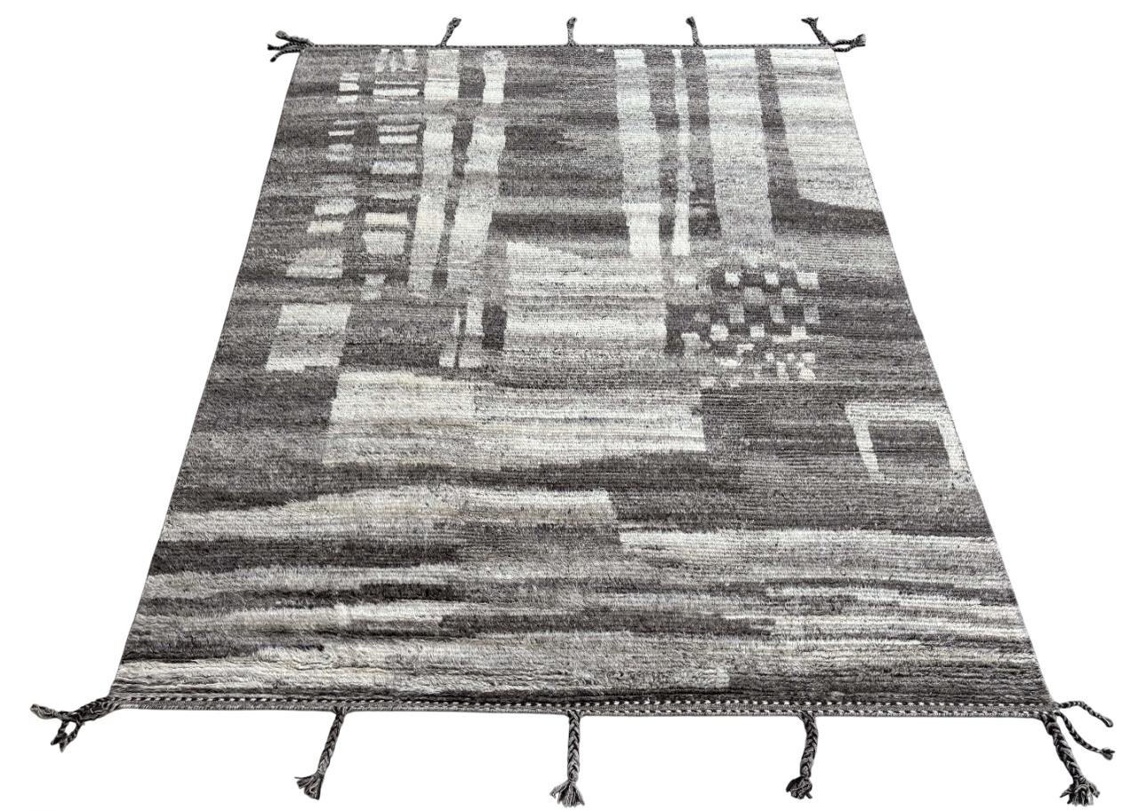 Elevate your living space with the exquisite charm of this new modern hand-knotted Moroccan berber beni ourain rug, crafted with precision and care from 100% wool. Combining the allure of Moroccan design with contemporary sensibilities, this rug is