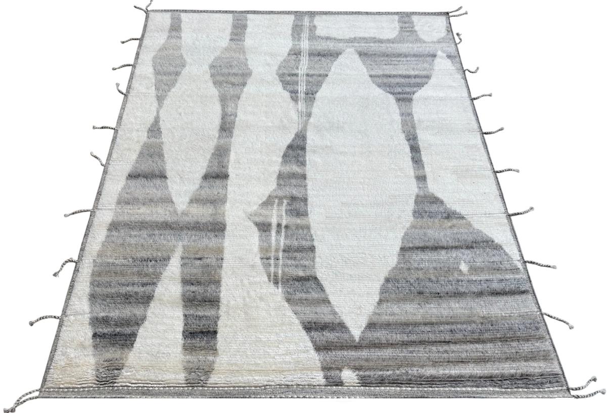 Elevate your living space with the exquisite charm of this new modern hand-knotted Moroccan berber beni ourain rug, crafted with precision and care from 100% wool. Combining the allure of Moroccan design with contemporary sensibilities, this rug is