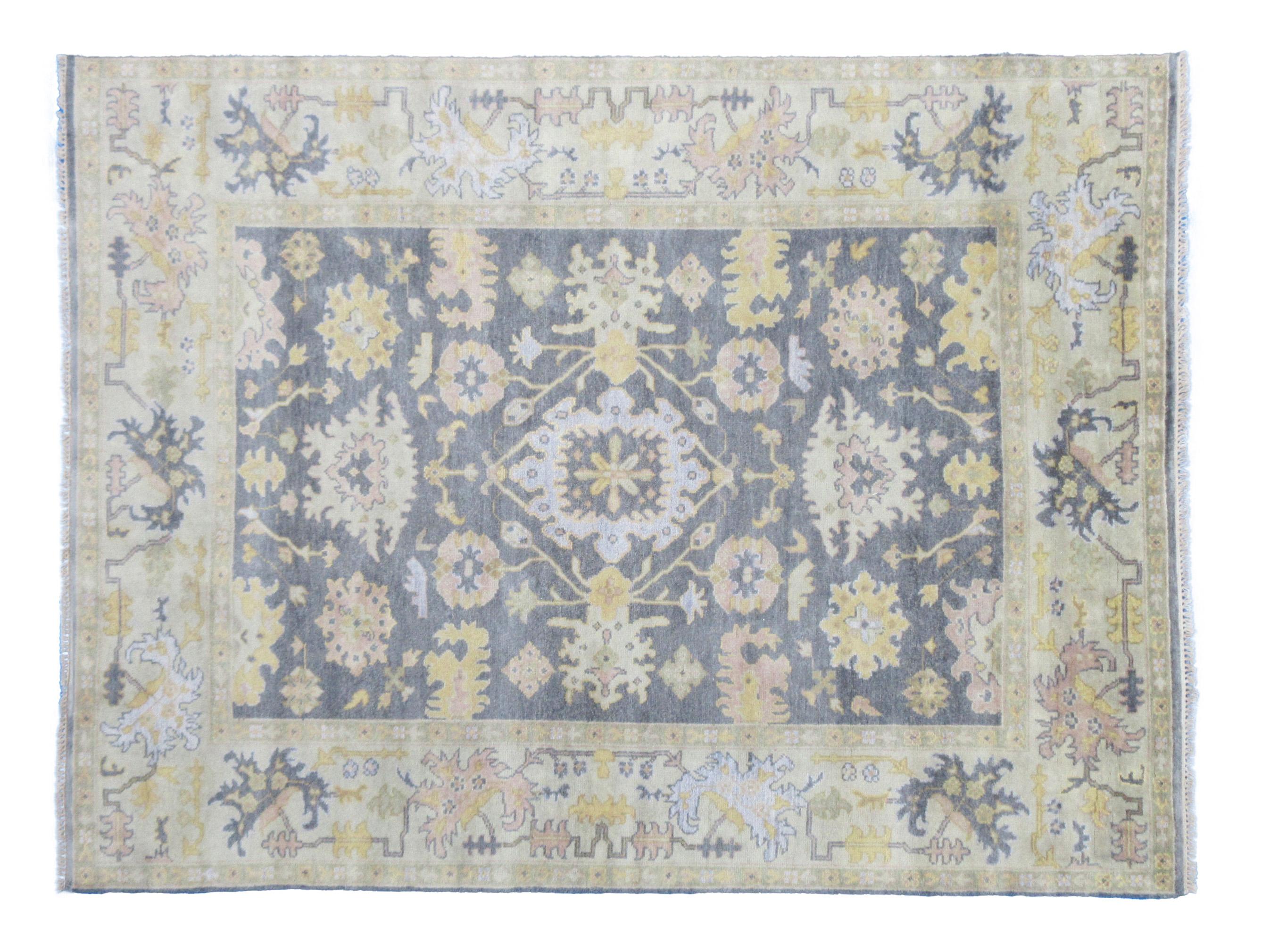 Hand-knotted, wool pile on a cotton foundation.

Dimensions: 8' x 10'

Field color: Gray

Border color: Light-Blue

Accent colors: Yellow.