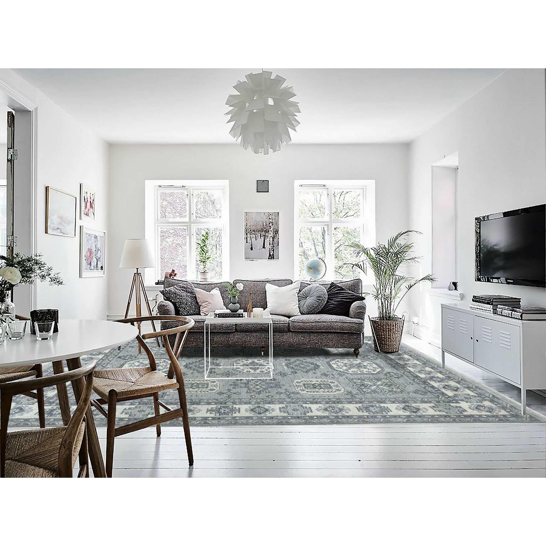 This is a truly genuine one-of-a-kind Gray Pure Wool Hand-Knotted Peshawar With Karajeh Design Oriental Rug. It has been Knotted for months and months in the centuries-old Persian weaving craftsmanship techniques by expert