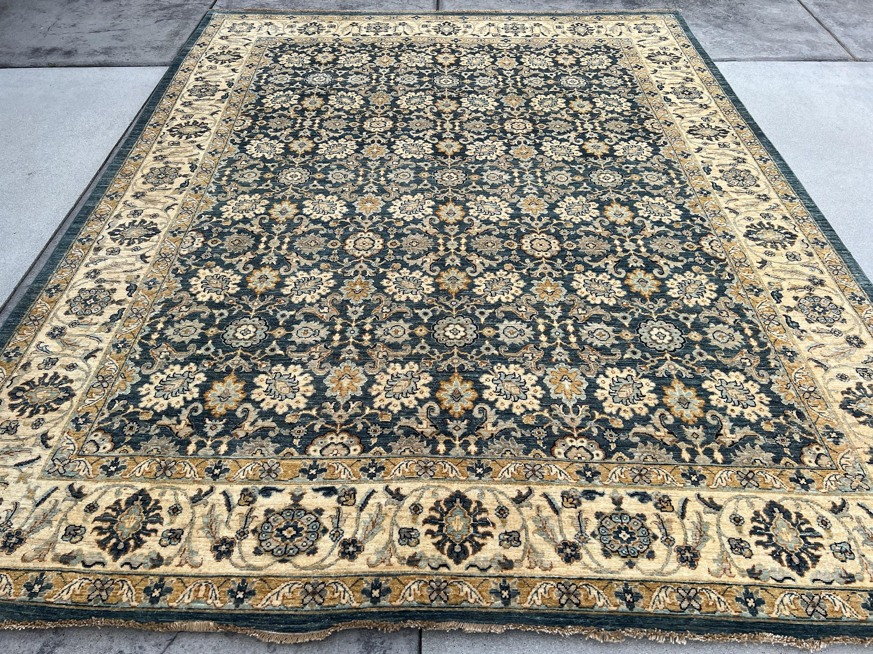 This rug was made with 100% premium, Afghan-sourced Ghazni wool with a cotton foundation. The rich colors are dipped in natural dyes to create an heirloom finish that does not bleed and is meant to last for generations. Sourced through fair trade