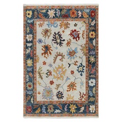 Tappeto in lana 8x10 avorio e blu con motivo floreale Oushak moderno annodato a mano