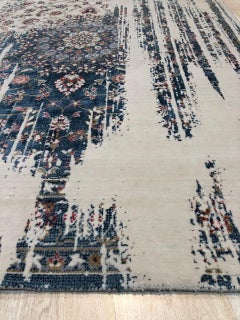8x10 Ivory Machine Made Wool Viscose Distressed Floral Cascade Geometric Carpet