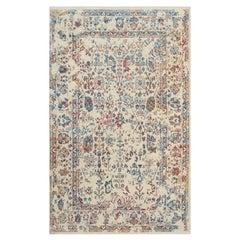 8x10 Ivory Machine Made Wool Viscose Faded Floral Border Geometric Carpet Rug