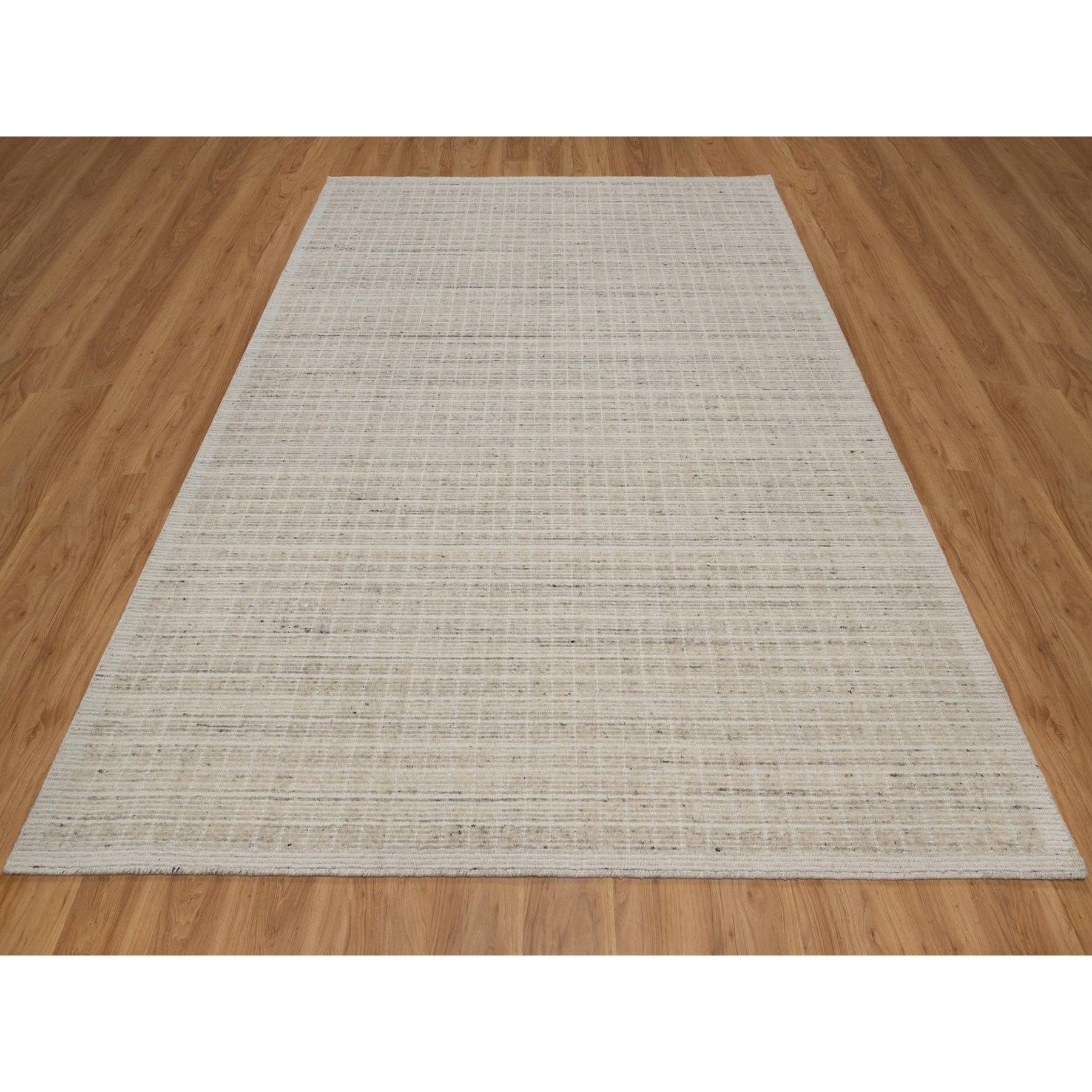 Chiffon White, Modern Plain Decor Box Design, Soft to Touch, Pure Wool, Loomed Knotted, Oriental Rug
Primary materials: Wool
Latex: No Pile 
height: 0.25 Inches
Style: Contemporary
Primary color: Ivory
Secondary colors: Beige
Pattern: Oriental