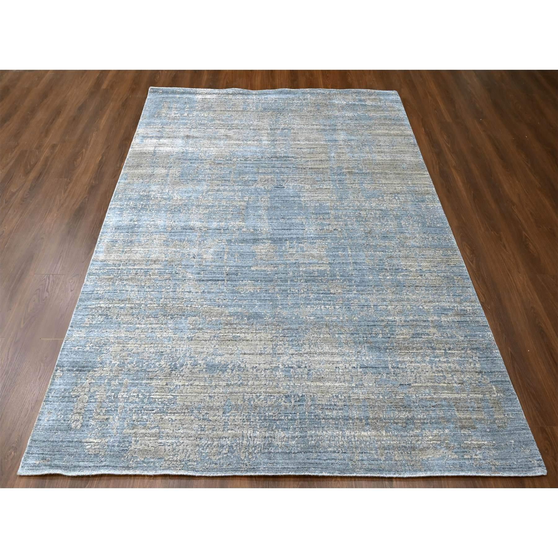 Marengo Gray, Modern Design, Hand Loomed, Wool and Plant Based Silk, Textured Pile, Oriental Rug
Primary materials: Wool & Silk
Latex: No Pile 
height: 0.25 Inches
Style: Contemporary
Primary color: Grey
Secondary colors: Brown
Pattern: Oriental