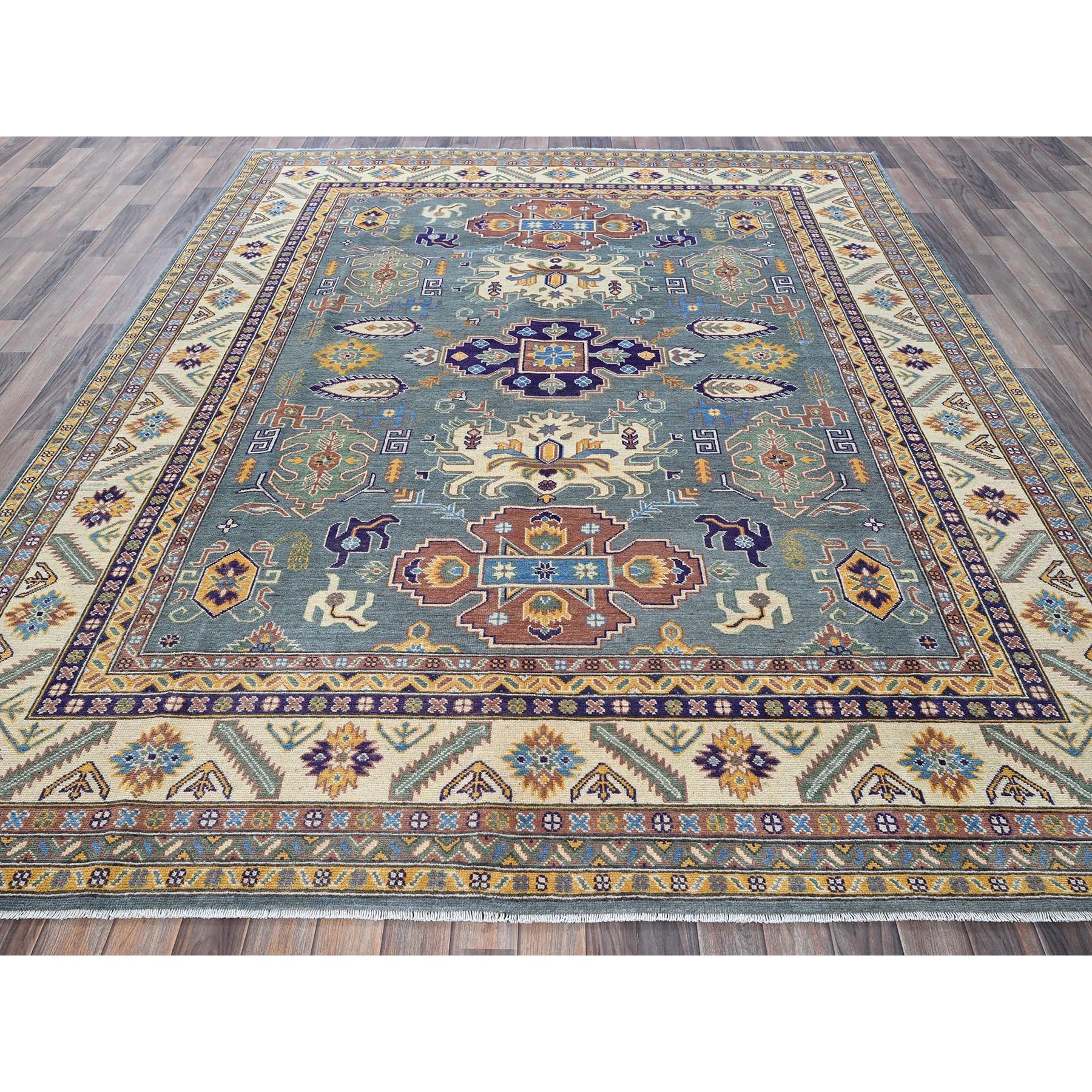 Misty Gray, Kazak with Tribal Medallions Design, Hand Knotted, Denser Weave, Soft and Vibrant Wool, Vegetable Dyes, Oriental Rug
Primary materials: Wool
Latex: No Pile 
height: 0.25 Inches
Style: Traditional
Primary color: Grey
Secondary colors: