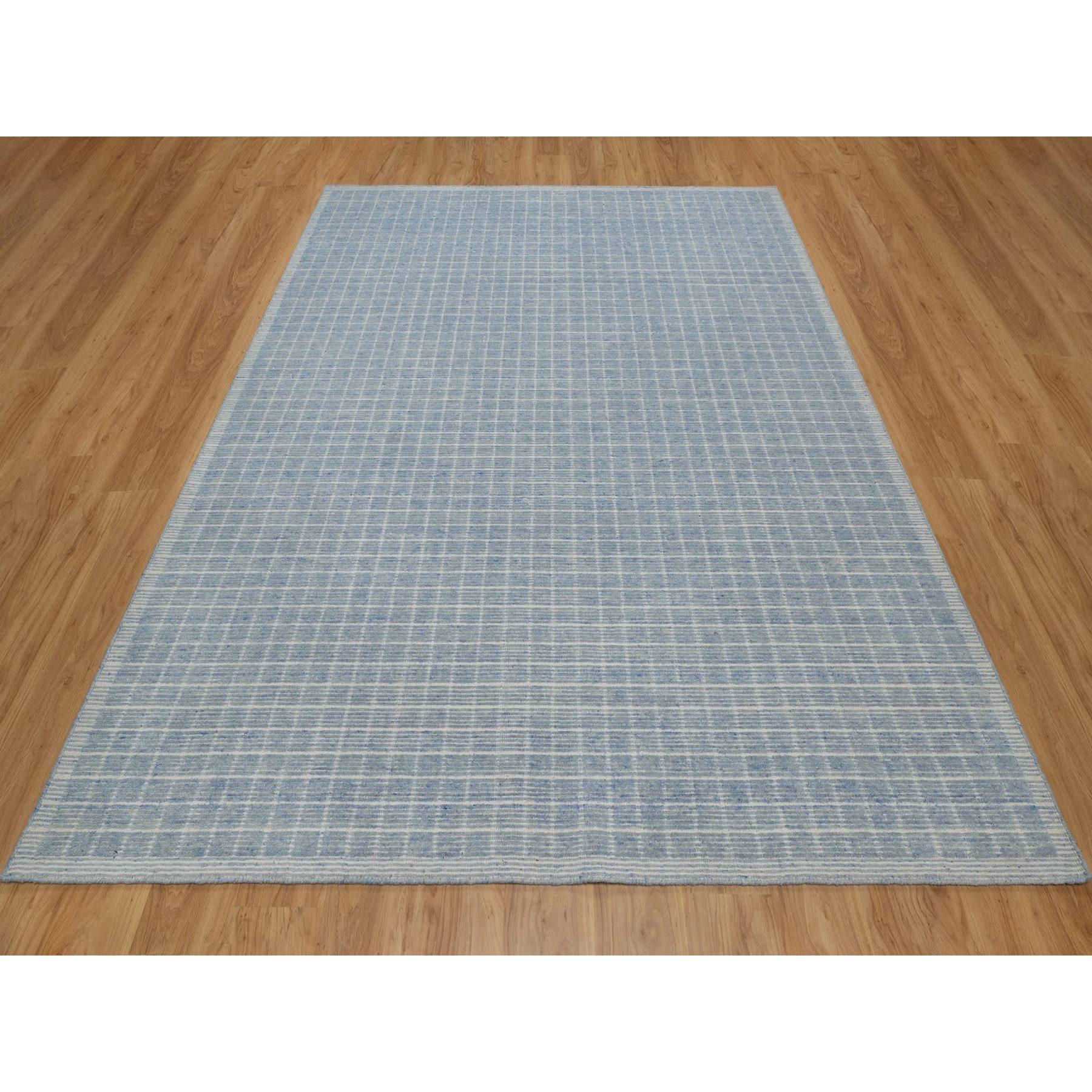 Stone Blue, Modern Plain Decor Box Design, Loomed Knotted, Soft to Touch, Pure Wool, Oriental Rug
Primary materials: Wool
Latex: No Pile 
height: 0.25 Inches
Style: Contemporary
Primary color: Blue
Secondary colors: Ivory
Pattern: Oriental