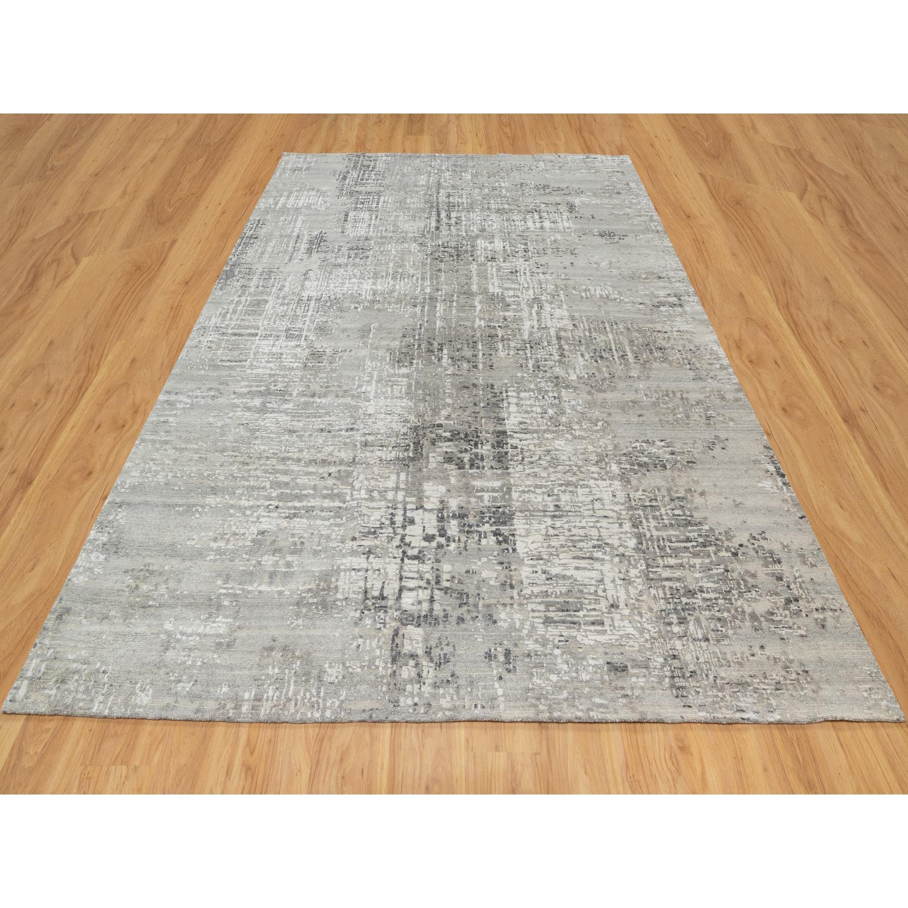 Pastel Gray, Hand Knotted, Modern, Hand Spun, Undyed Natural Wool, Oriental Rug
Primary materials: Wool
Latex: No Pile 
height: 0.25 Inches
Style: Transitional
Primary color: Grey
Secondary colors: Ivory, Olive Black, Frost White
Pattern: Oriental