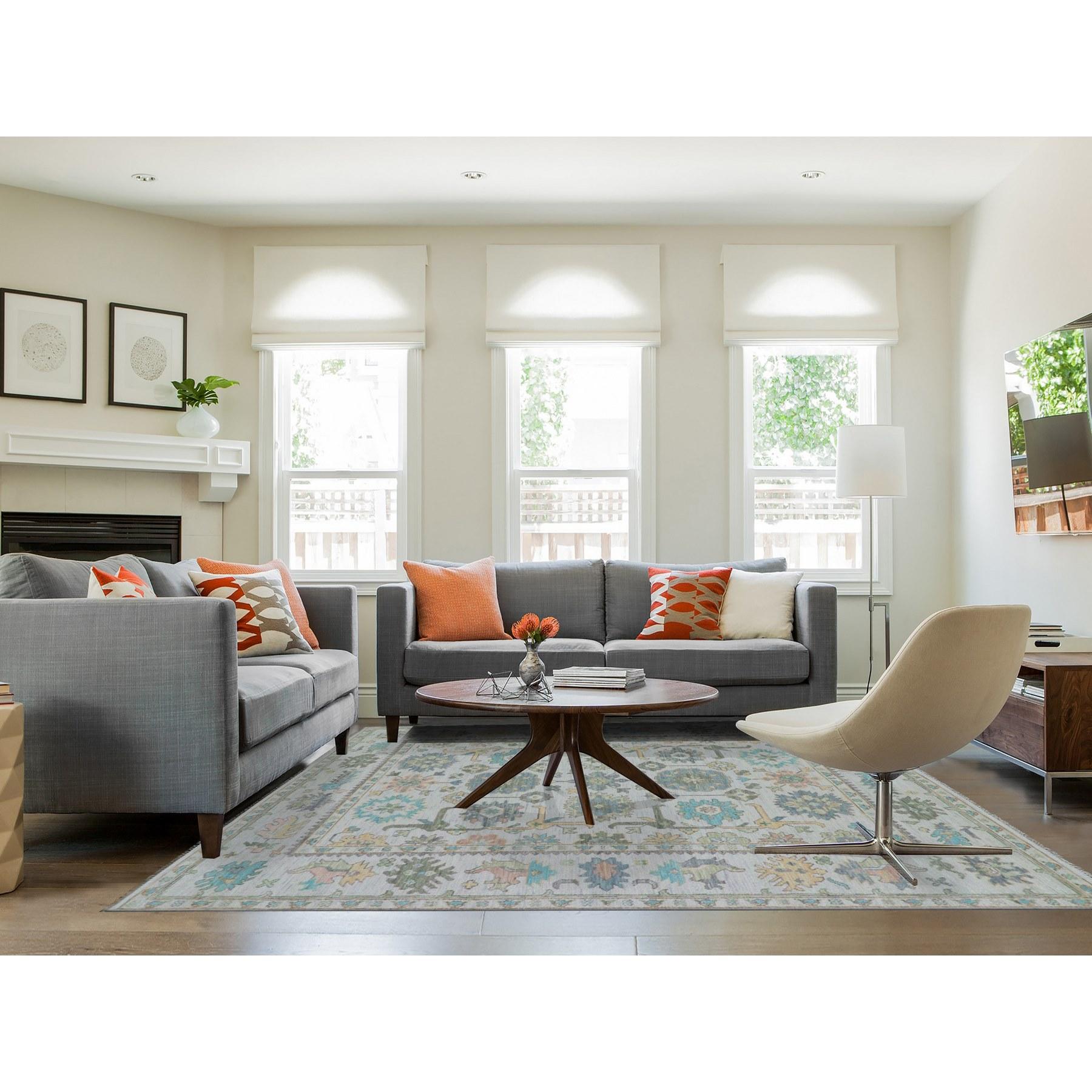 Cascading White, Hand Knotted, Oushak Weave and Design, Lush Pile, 100% Wool, Pastel Colors, Oriental Rug
Primary materials: Wool
Latex: No Pile 
height: 0.25 Inches
Style: Transitional
Primary color: Ivory
Secondary colors: Blue, Brown, Green, Red,