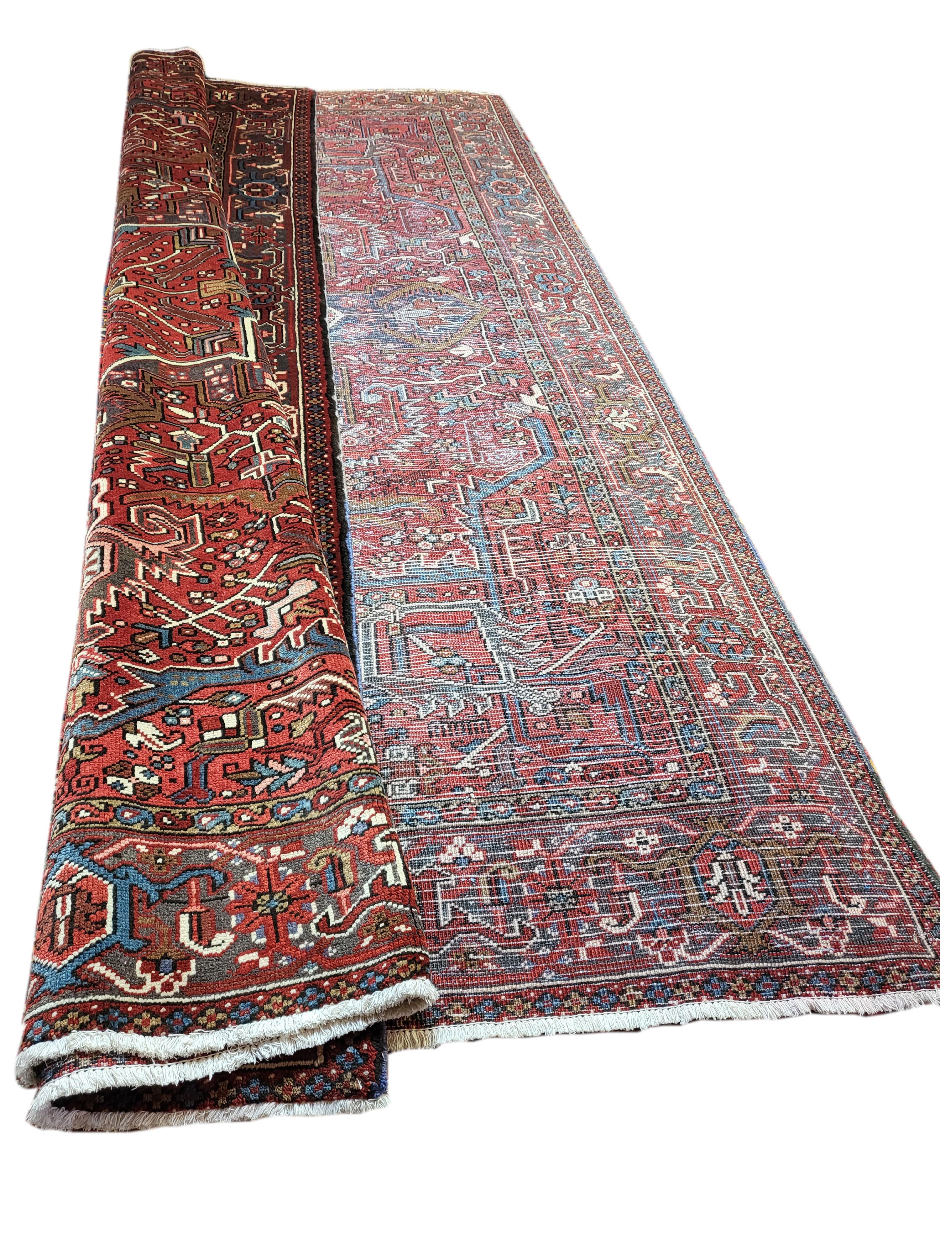 Beautiful, rusty Persian Heriz. Heriz's are the number one Persian rug in the world and for good reason! they are plush, sturdy and woven with fine wool that glistens in the light. This particular piece if fairly unique do to it's low contrast for