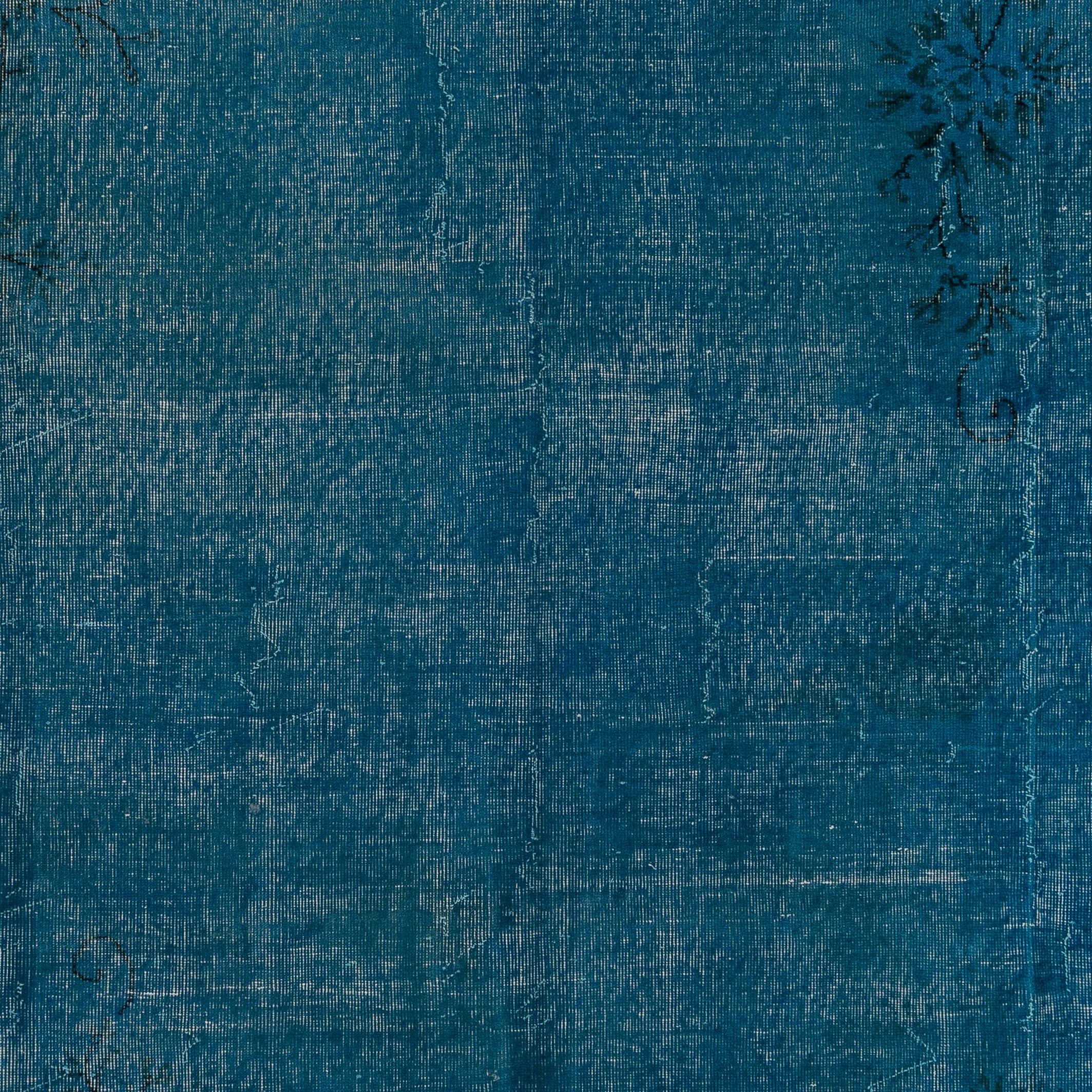 A vintage Turkish rug re-dyed in blue color.
Finely hand knotted, low wool pile on cotton foundation. Deep washed.
Sturdy and can be used on a high traffic area, suitable for both residential and commercial interiors. 
Measures: 8.2 x 11.8 ft.
 