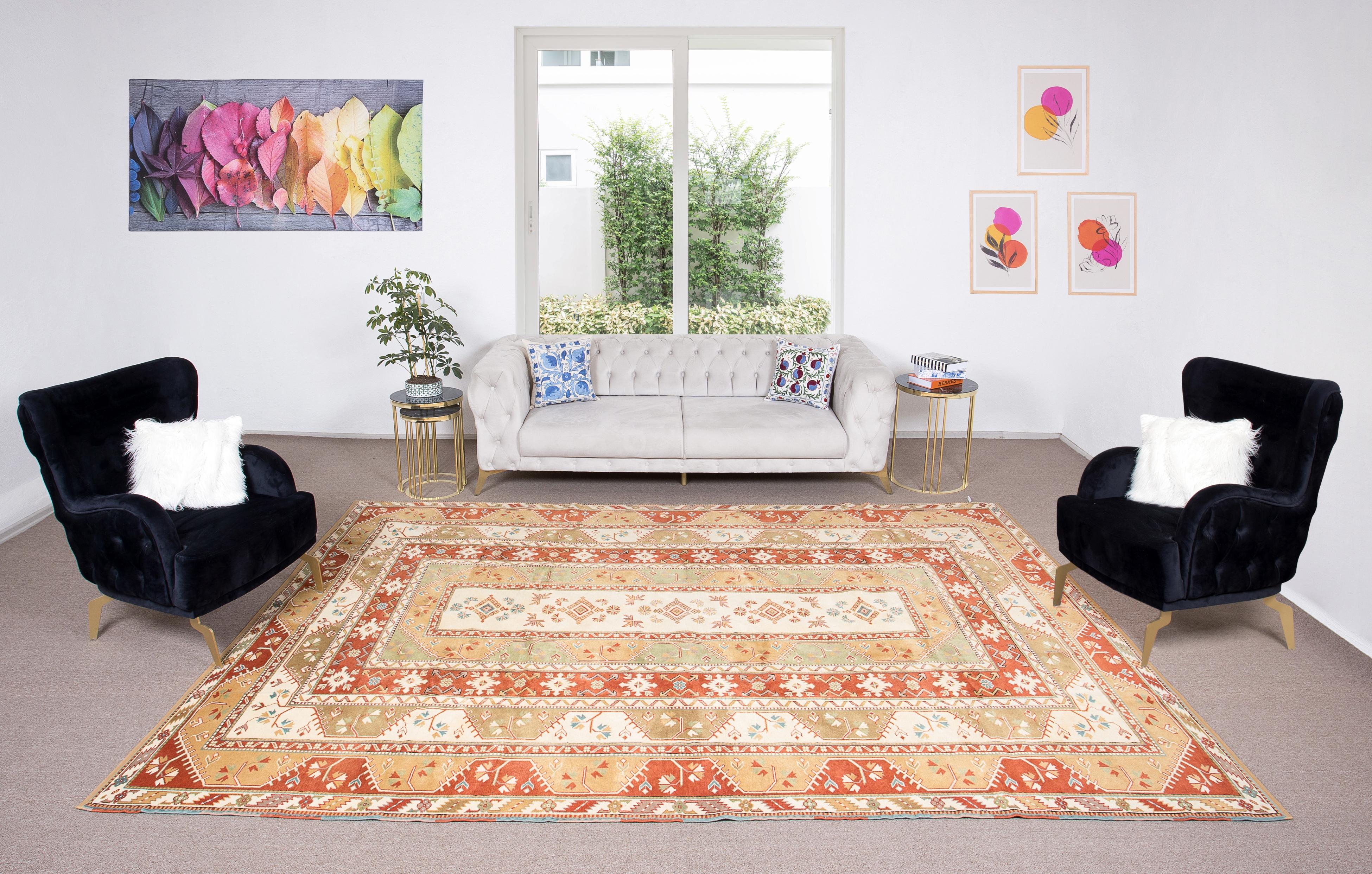A finely hand-knotted vintage Turkish rug from 1960s. The rug is made of medium wool pile on wool foundation. It is heavy and lays flat on the floor, in very good condition with no issues. It has been washed professionally, the rug is sturdy and can