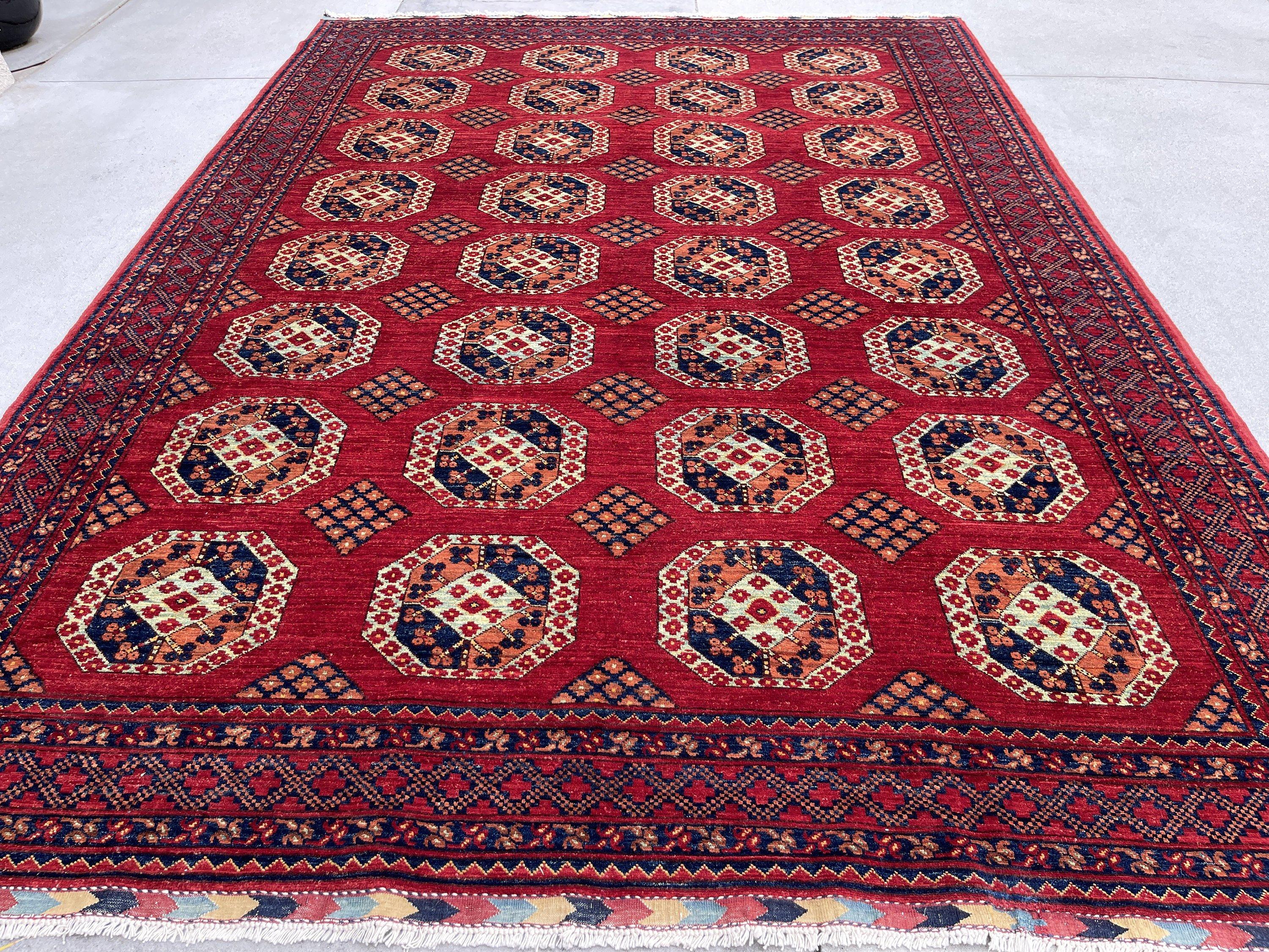 This rug was made with 100% premium, Afghan-sourced Ghazni wool with a cotton foundation. The rich colors are dipped in natural dyes to create an heirloom finish that does not bleed and is meant to last for generations. Sourced through fair trade