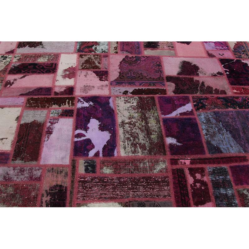Vintage distressed overdyed Persian rug from RenCollection rugs –This vintage Persian Tabriz rug has been re-purposed through a distressing process and over-dyed to achieve a singular magenta color. Created by the artisans of Iran. Measures: 8 x