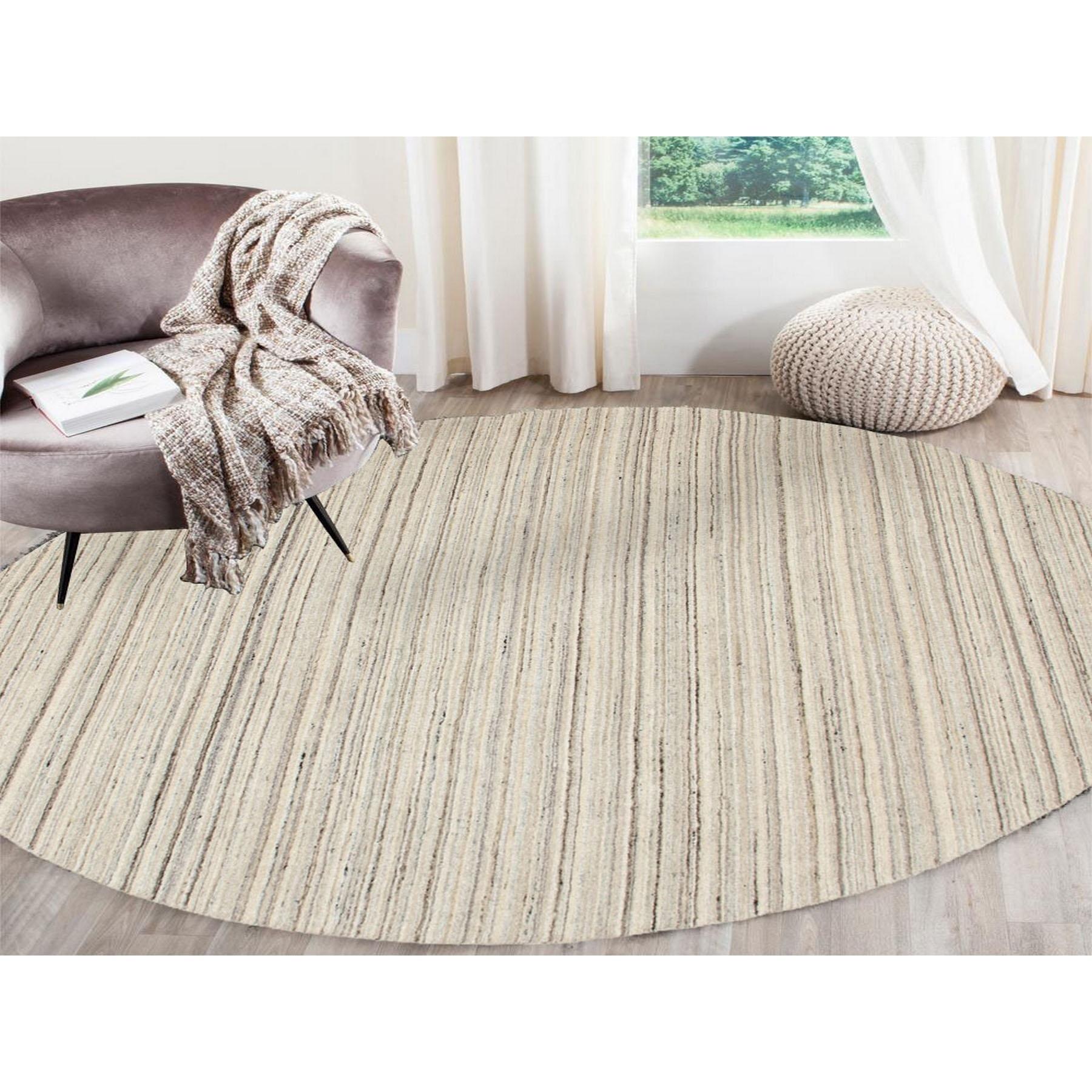 This is a truly genuine one-of-a-kind Beige Hand Loomed Organic Wool Modern Oriental Rug. It has been woven for months and months in the centuries-old Persian weaving craftsmanship techniques by expert artisans.
Primary materials: Wool
Latex: No