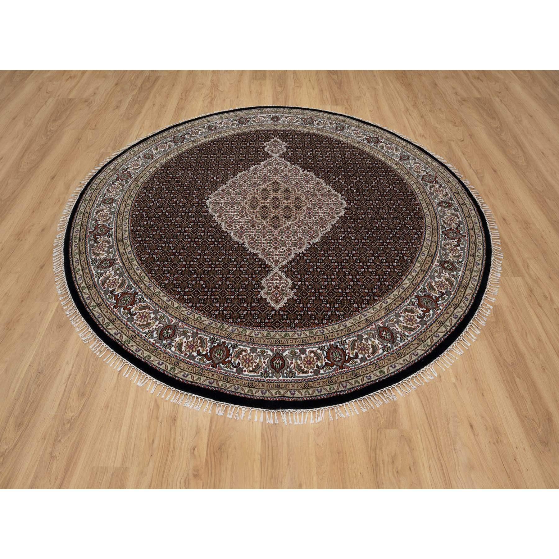 Pitch Black, Tabriz Mahi with Fish Medallion Design, 175 KPSI, Soft and Pure Wool, Hand Knotted, Round, Oriental Rug
Primary materials: Wool
Latex: No Pile 
height: 0.25 Inches
Style: Traditional
Primary color: Black
Secondary colors: Green, Brown,