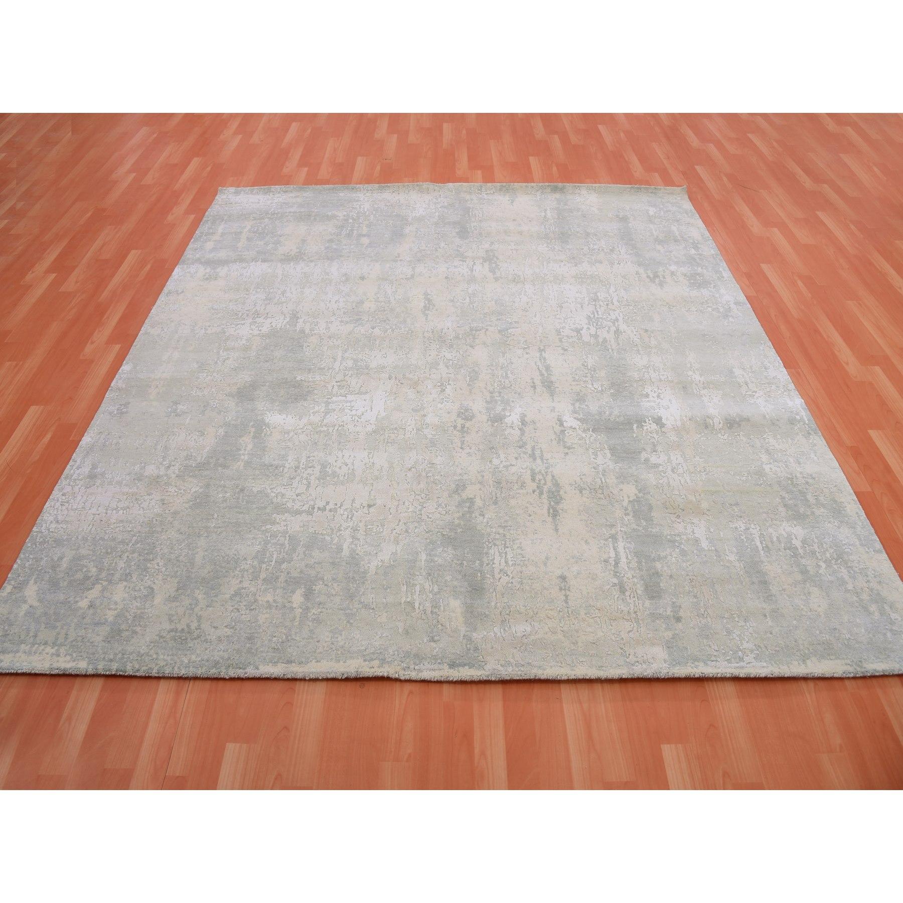 This is a truly genuine one-of-a-kind Hand Knotted Modern Abstract Design Wool and Silk Oriental Rug. It has been Knotted for months and months in the centuries-old weaving craftsmanship techniques by expert artisans.
Primary materials: Wool &