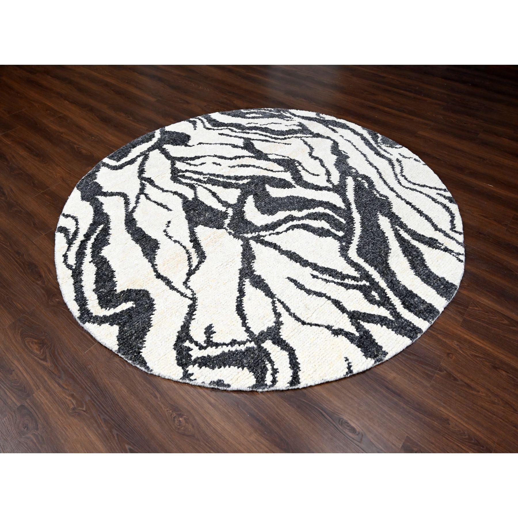This is a truly genuine one-of-a-kind Hand Knotted, Tone on Tone Modern Design, Undyed Natural Wool, Round, Oriental Rug. It has been Knotted for months and months in the centuries-old weaving craftsmanship techniques by expert artisans.
Primary