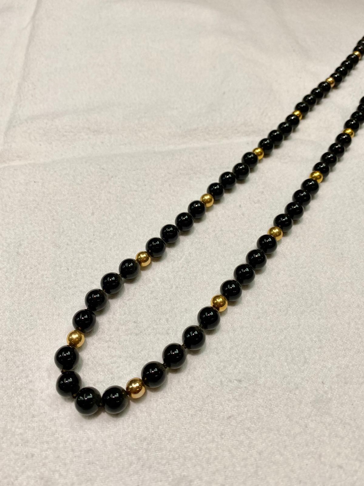 8X8mm 24 inches Onyx pearls with 14k yellow gold clasp
