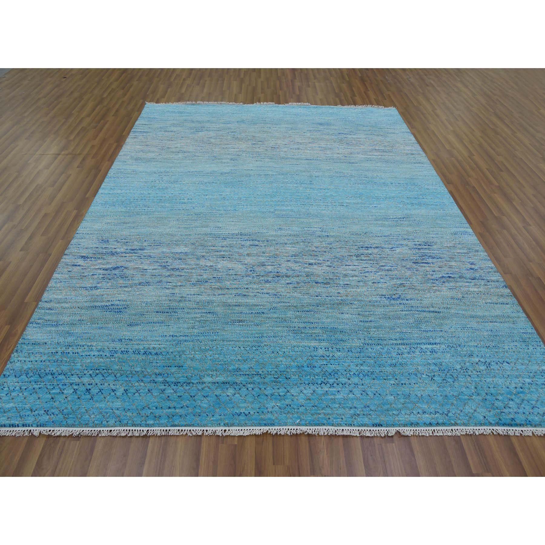 This is a truly genuine one-of-a-kind Blue, Pure Wool Hand Knotted, Modern Chiaroscuro Collection Thick and Plush, Oriental Rug. It has been Knotted for months and months in the centuries-old weaving craftsmanship techniques by expert
