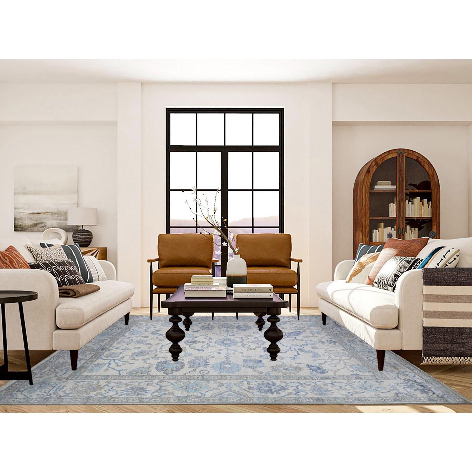 Ivory, Afghan Angora Oushak with Soft Color, Natural Dyes, 100% Wool, Hand Knotted, Oriental Rug
Primary materials: Wool
Latex: No Pile 
height: 0.25 Inches
Style: Transitional
Primary color: Ivory
Secondary colors: Blue, Light Blue, Black, Light