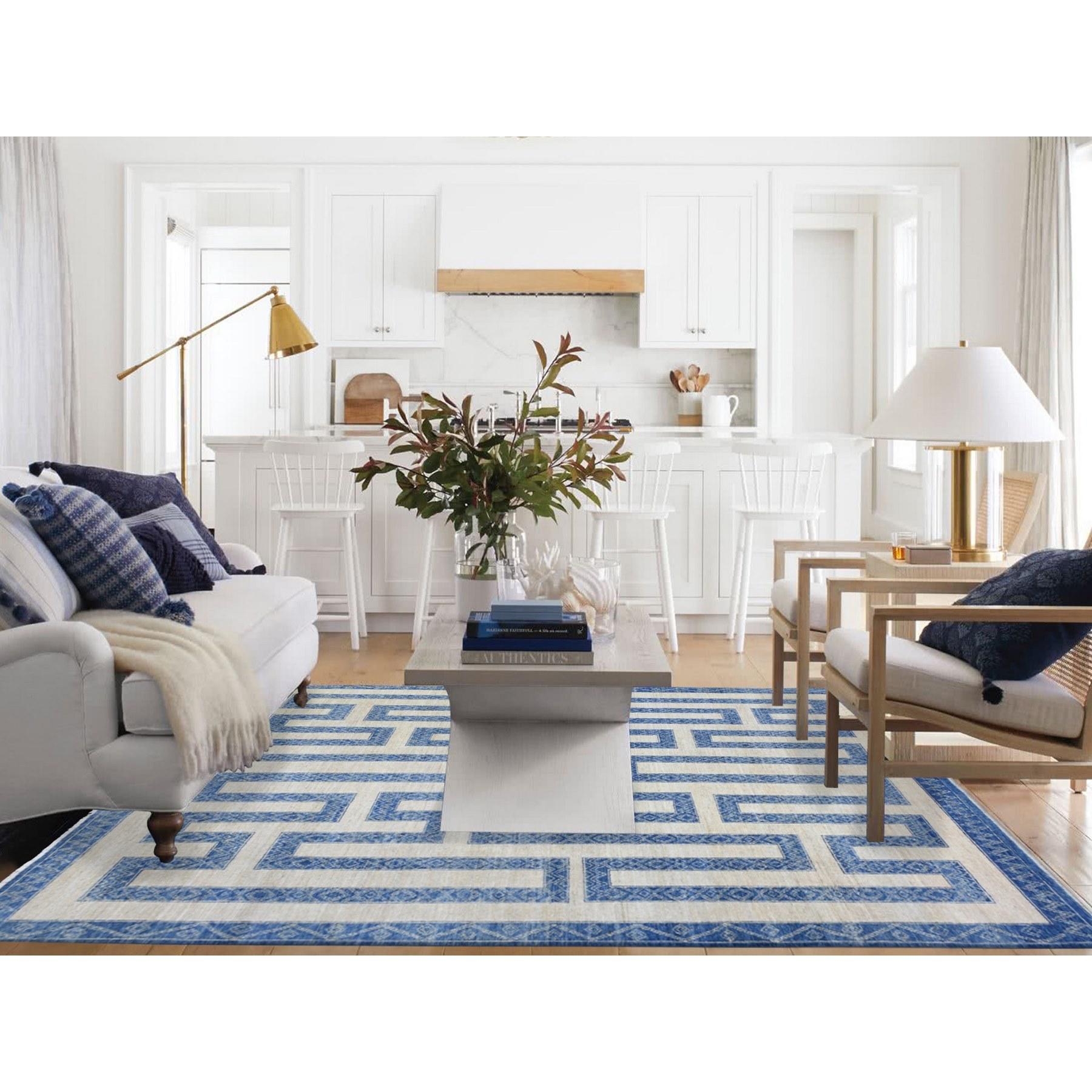This is a truly genuine one-of-a-kind Denim Blue, Fine Peshawar with Intricate Geometric Motifs Maze Design Dense Weave, Soft and Shiny Wool Hand Knotted, Oriental Rug. It has been Knotted for months and months in the centuries-old weaving