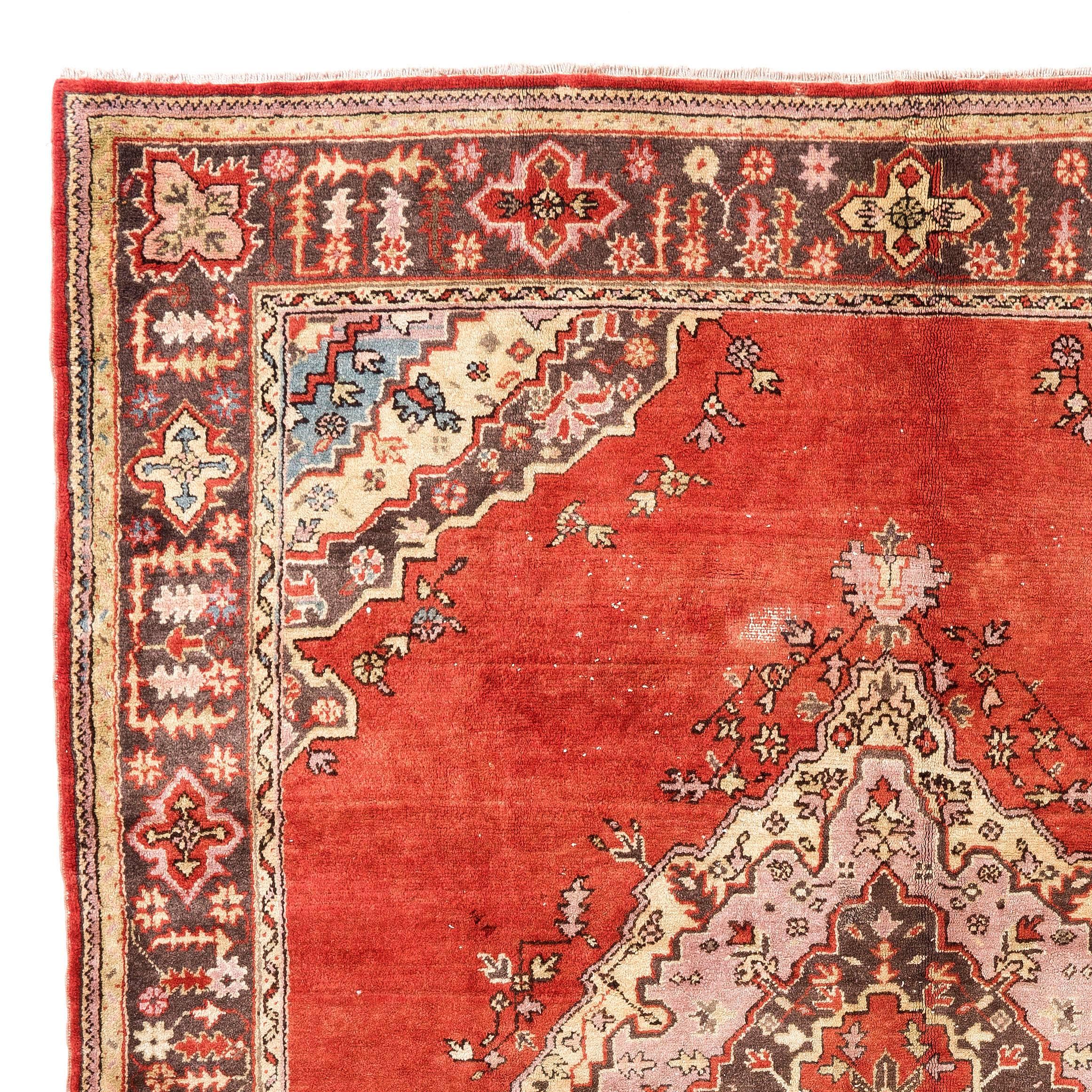 An antique Oushak rug from the first half of the 20th century with a rare square size of 8x9.5 ft. It rug has medium wool pile on wool foundation, is in good condition, very clean and sturdy.

It features a large lozenge-shaped medallion in red,