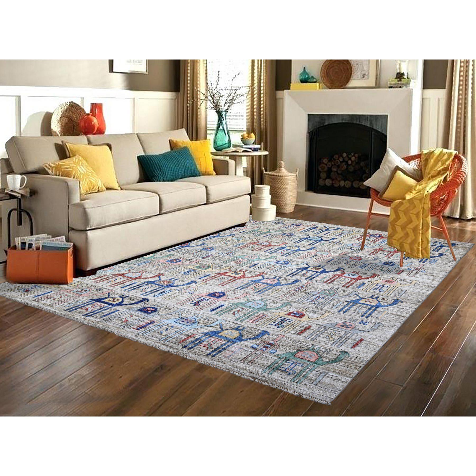This is a truly genuine one-of-a-kind Beige, Hand Knotted Anatolian Village Inspired with All Over Camel Figurines, Vegetable Dyes Extra Soft Wool, Oriental Rug. It has been Knotted for months and months in the centuries-old weaving craftsmanship