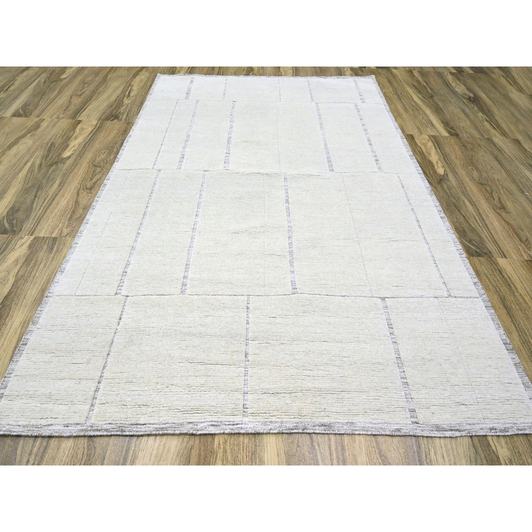 Parchment White, Modern with Geometric Design, Tone on Tone, Plain Squares, Textured Wool, Hand Knotted, Oriental Rug
Primary materials: Wool
Latex: No Pile 
height: 0.25 Inches
Style: Contemporary
Primary color: Ivory
Secondary colors: