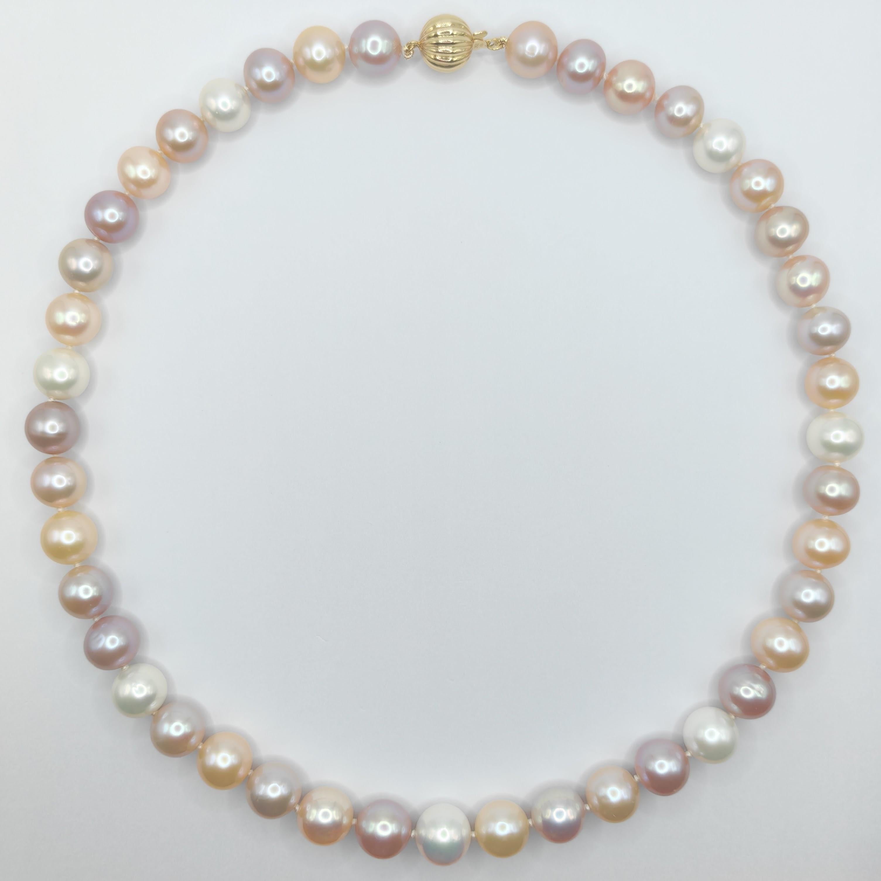 Introducing our 18-inch 9-10mm Multi-color Pink Peach White Round Pearl Necklace, a beautifully hand-knotted accessory that adds a touch of sophistication and style to both men's and women's wardrobes. These candy-colored pearls, with their